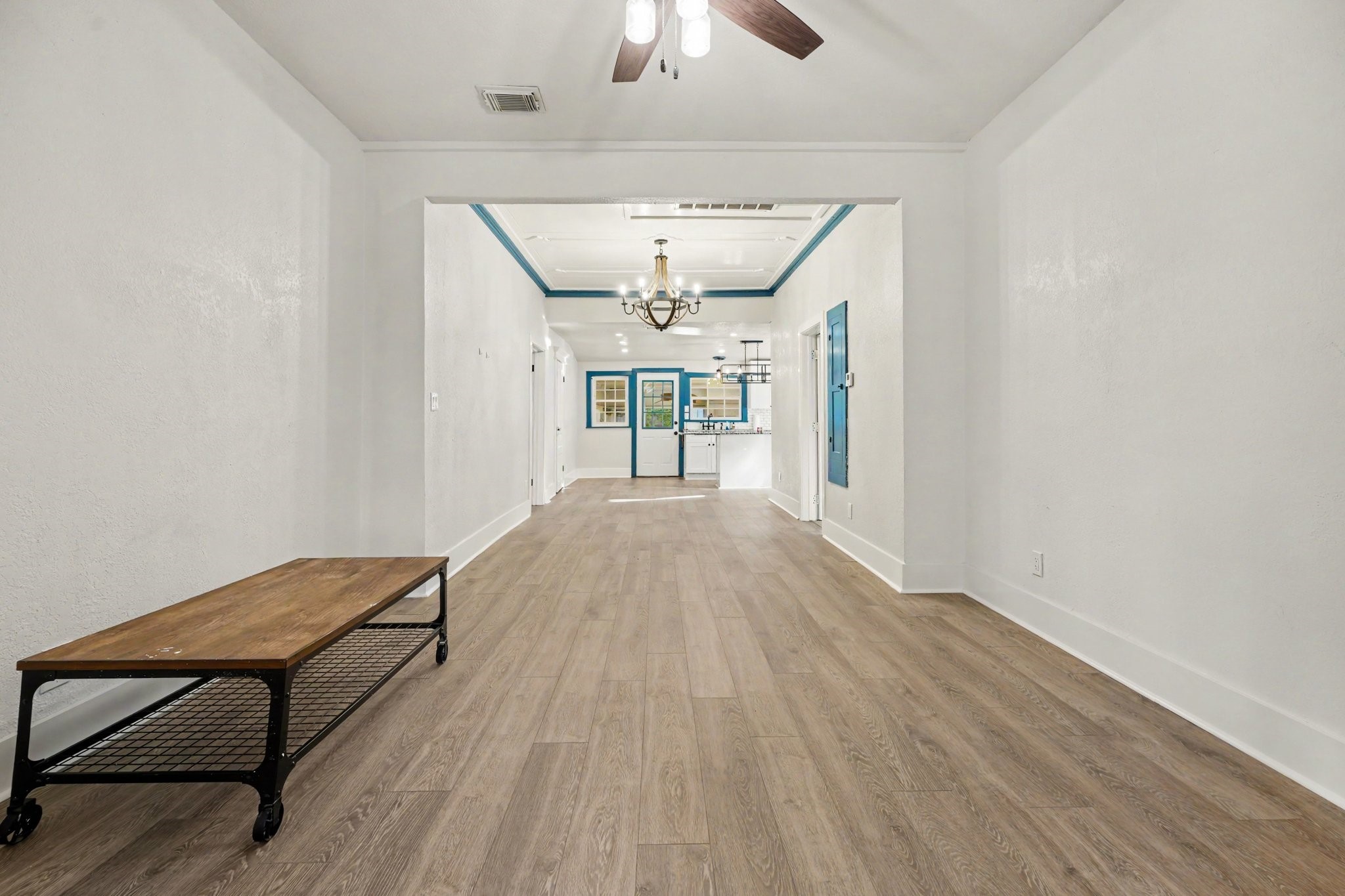 Living room dining view with updated LVP flooring Living room dining view with updated LVP flooring