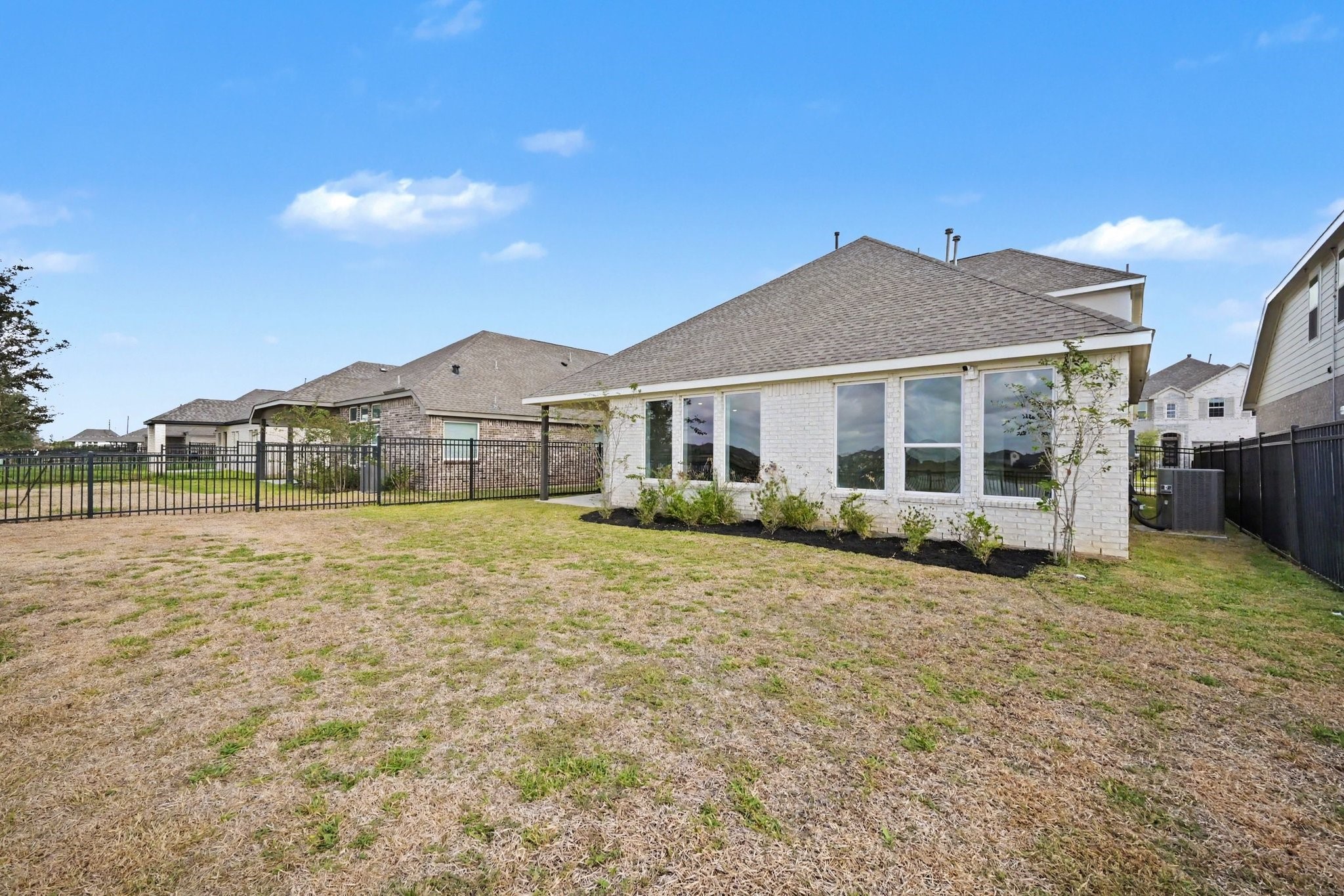 Oversized back yard with view of the lake
