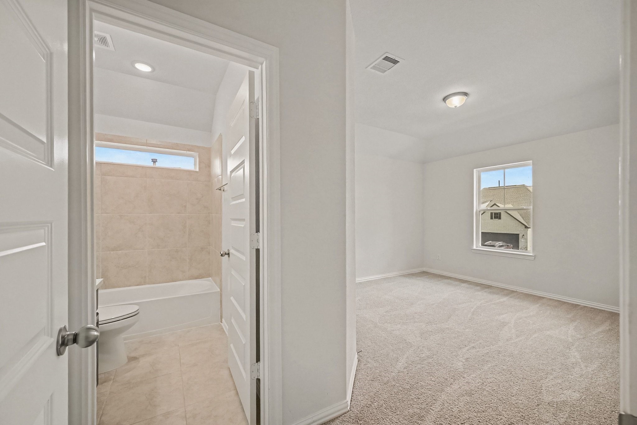 Secondary bedroom with ensuite bath