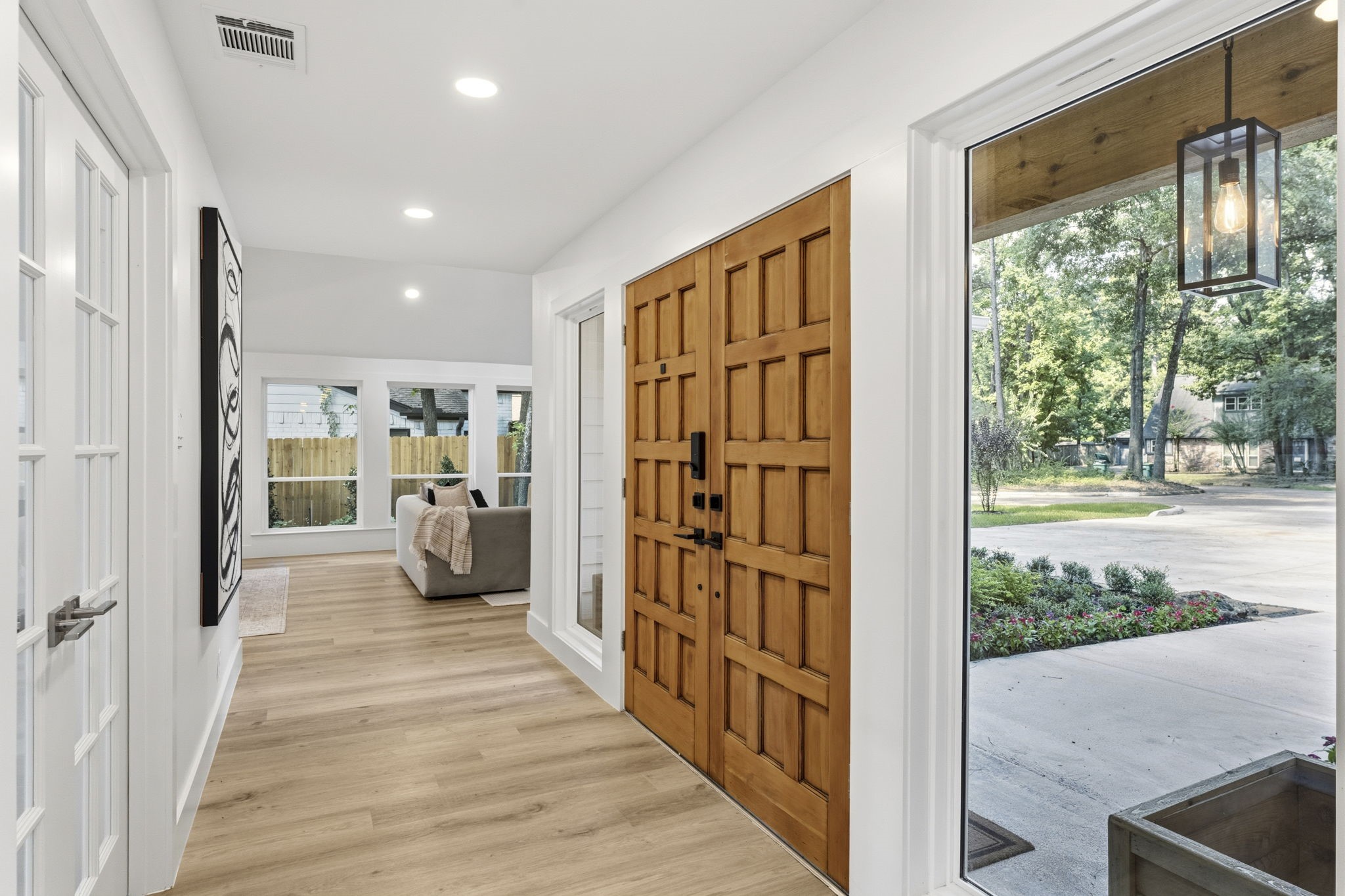 Expansive windows fill the space with natural light and the open sightlines provide a seamless flow into the heart of the home.