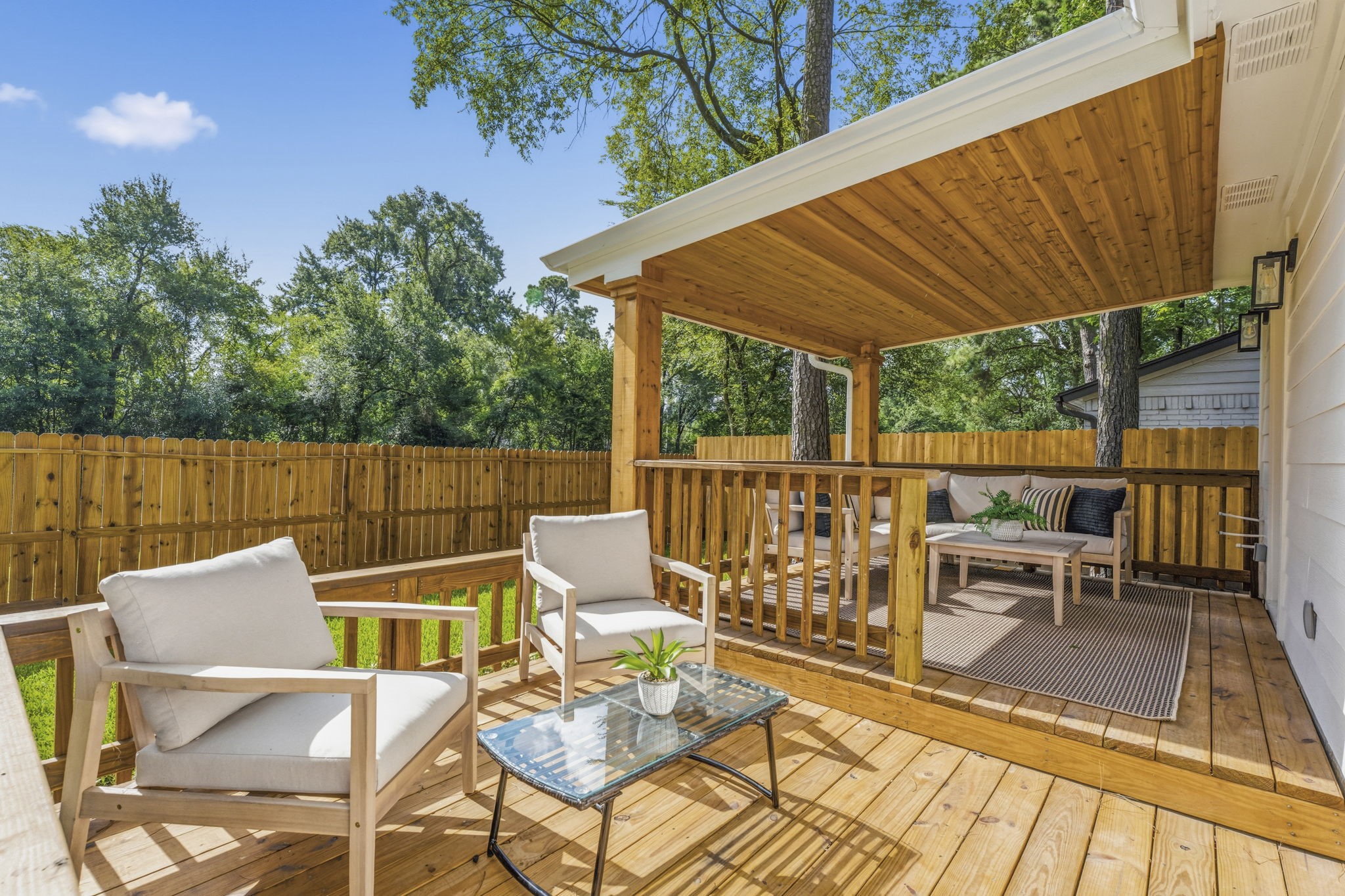 This is the ideal setting for outdoor dining, weekend gatherings, or simply relaxing while taking in the peaceful backyard views.