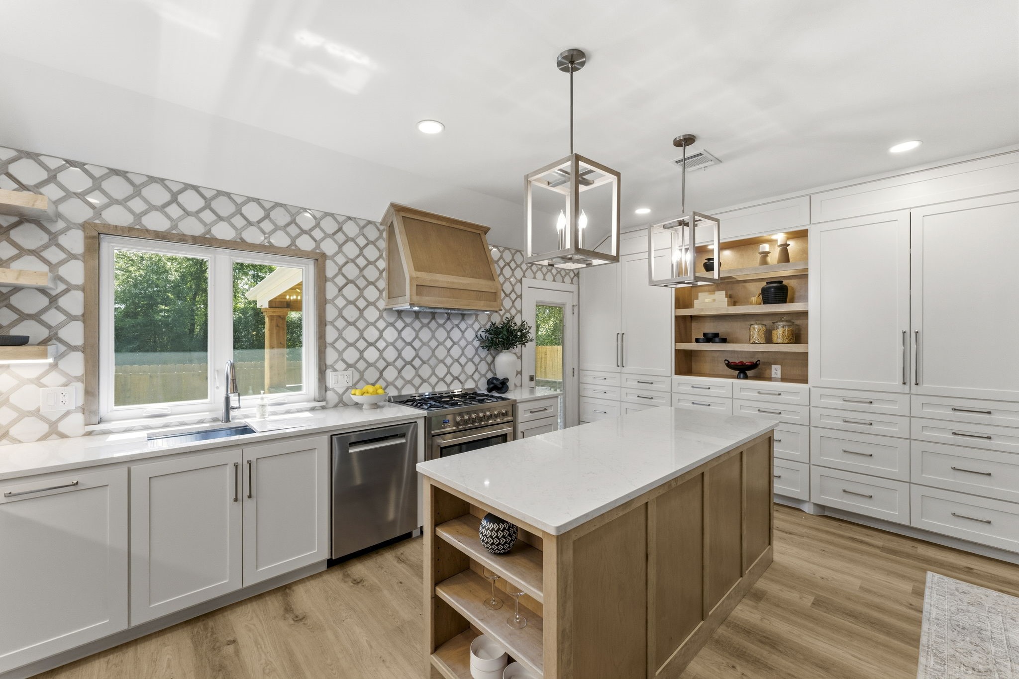 The oversized island offers generous prep space and seating.