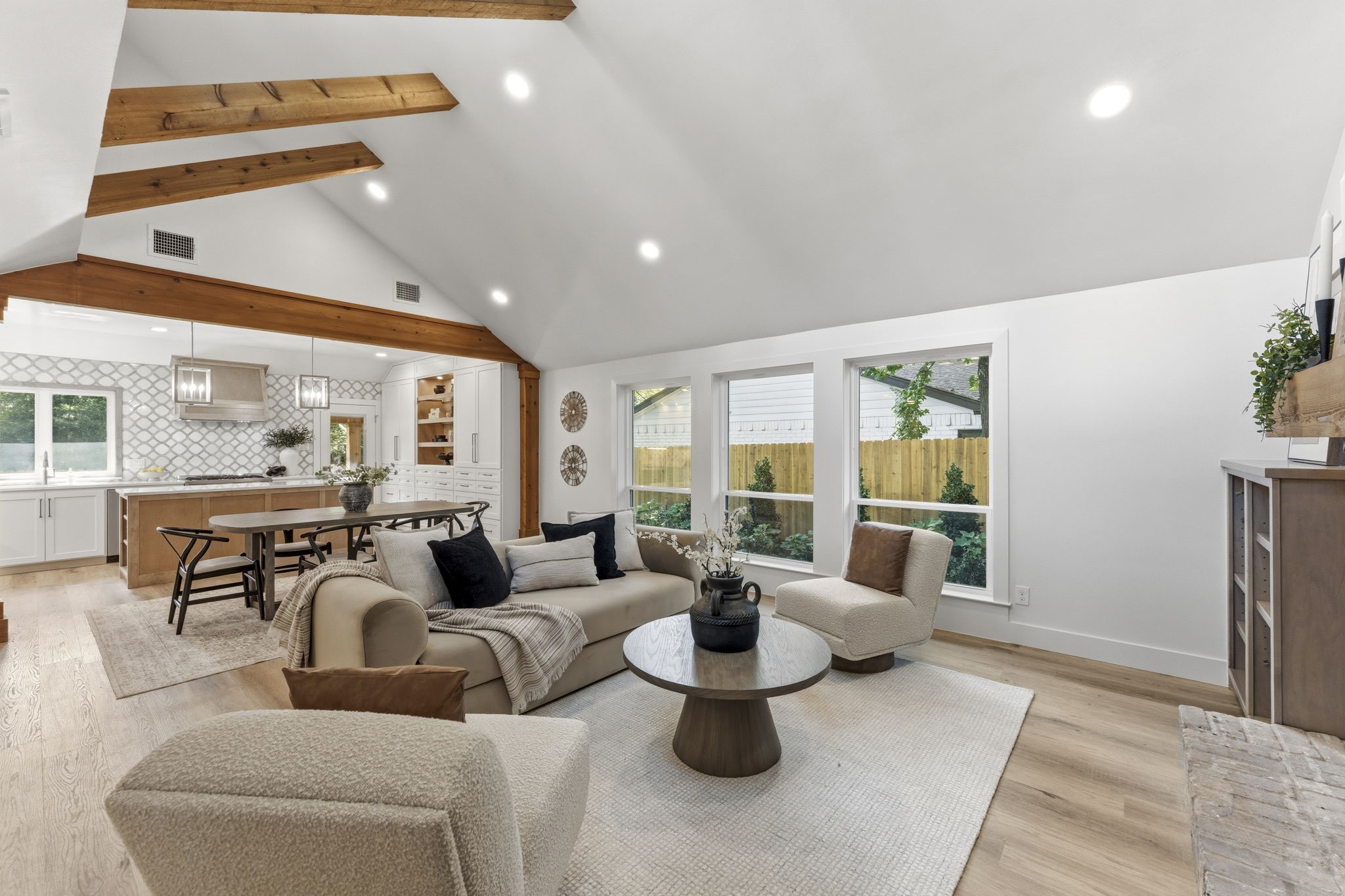 Oversized windows frame peaceful views and fill the home with natural light, creating an inviting space you'll love spending time in every day.
