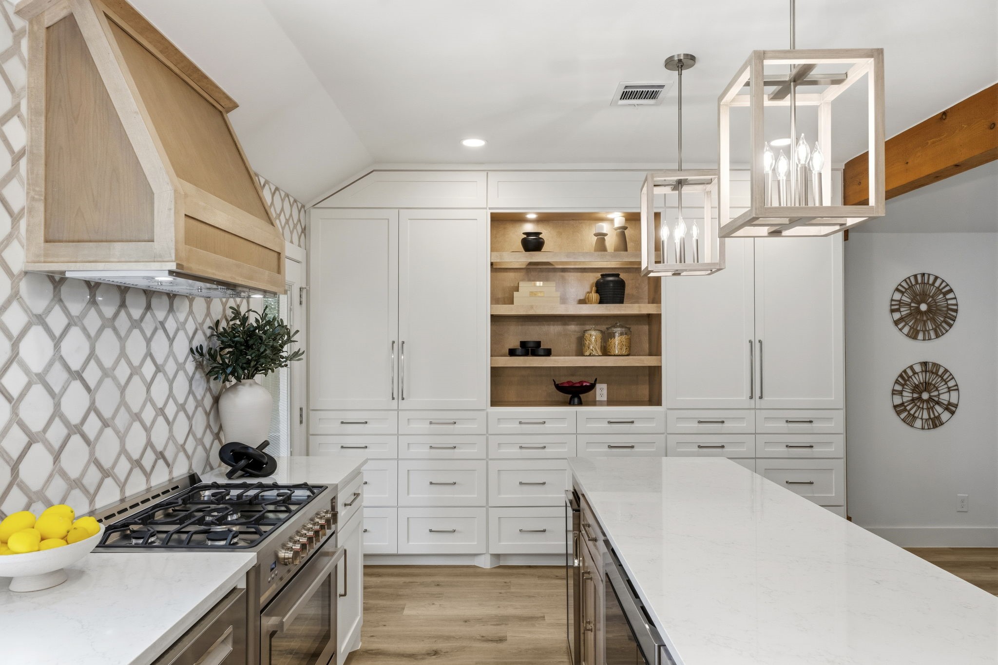Every detail, from the custom finishes to the designer lighting, was carefully selected to create a magazine worthy kitchen.