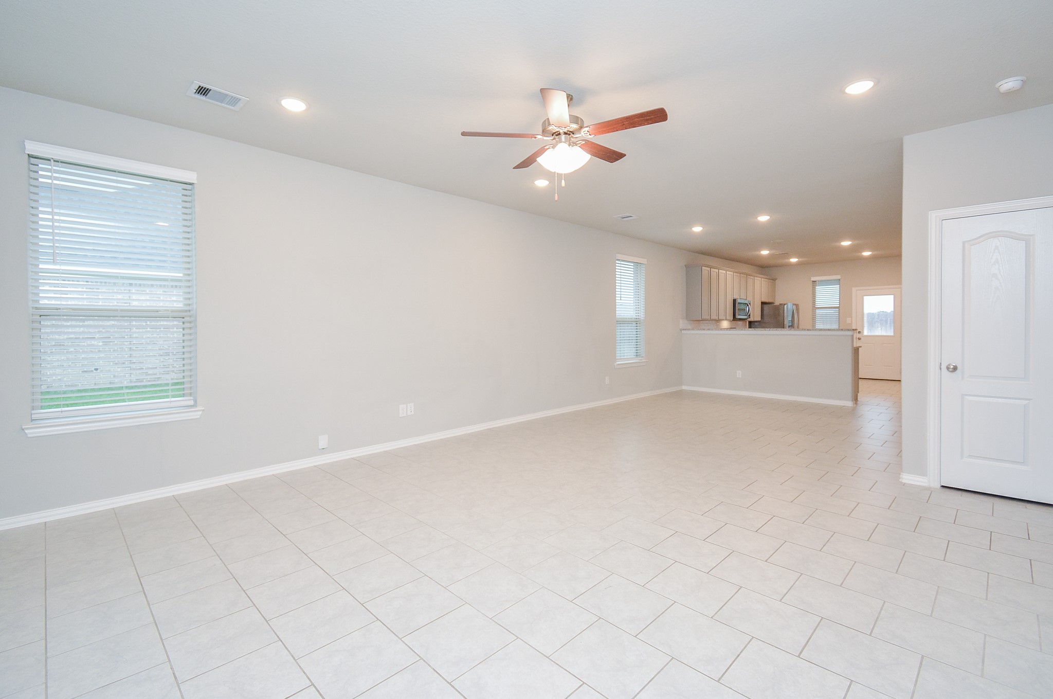 Nicely placed large windows leave plenty of available wall and floor space to accommodate your furnishings.