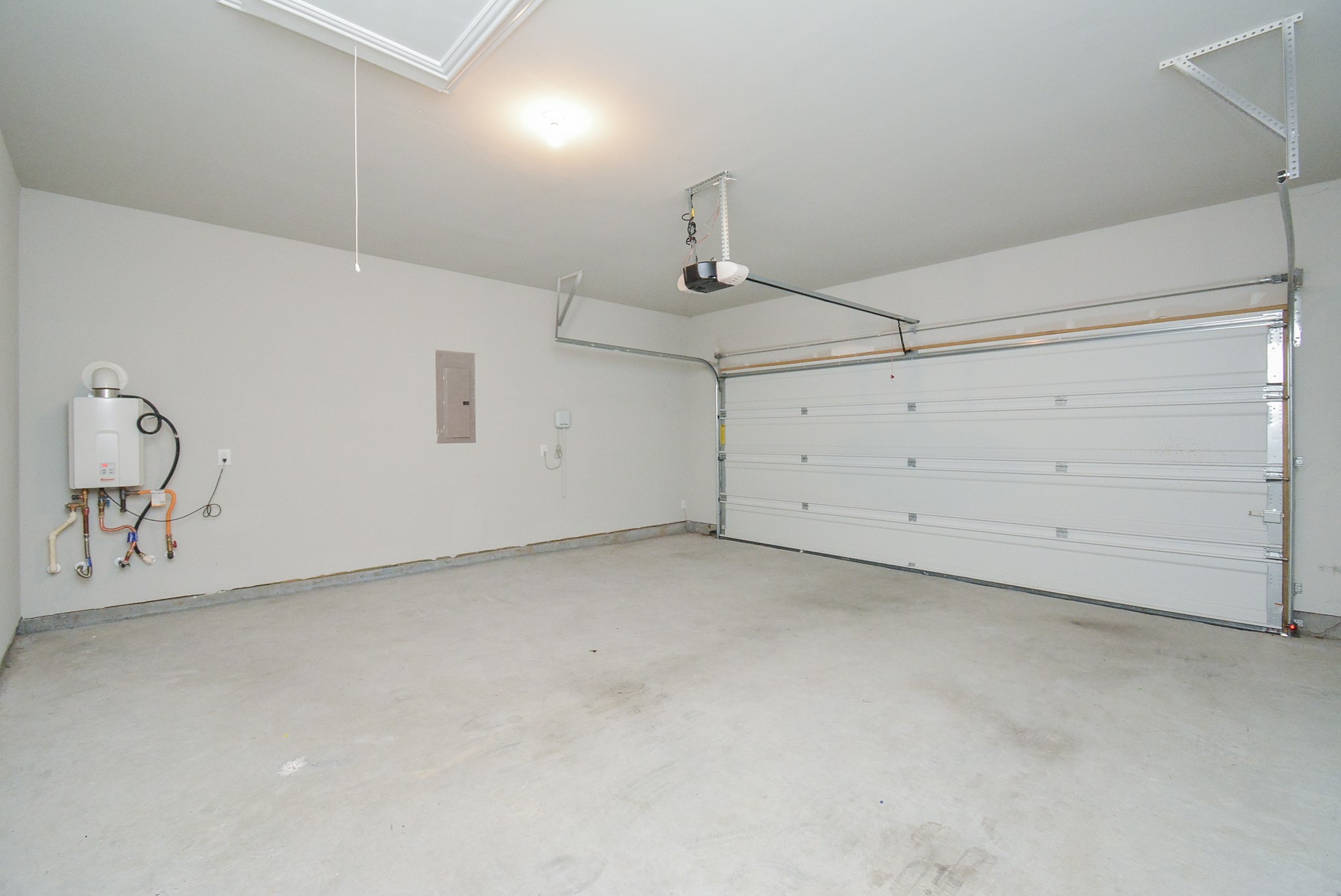 Even the dual-vehicle attached garage is roomy and spotless.