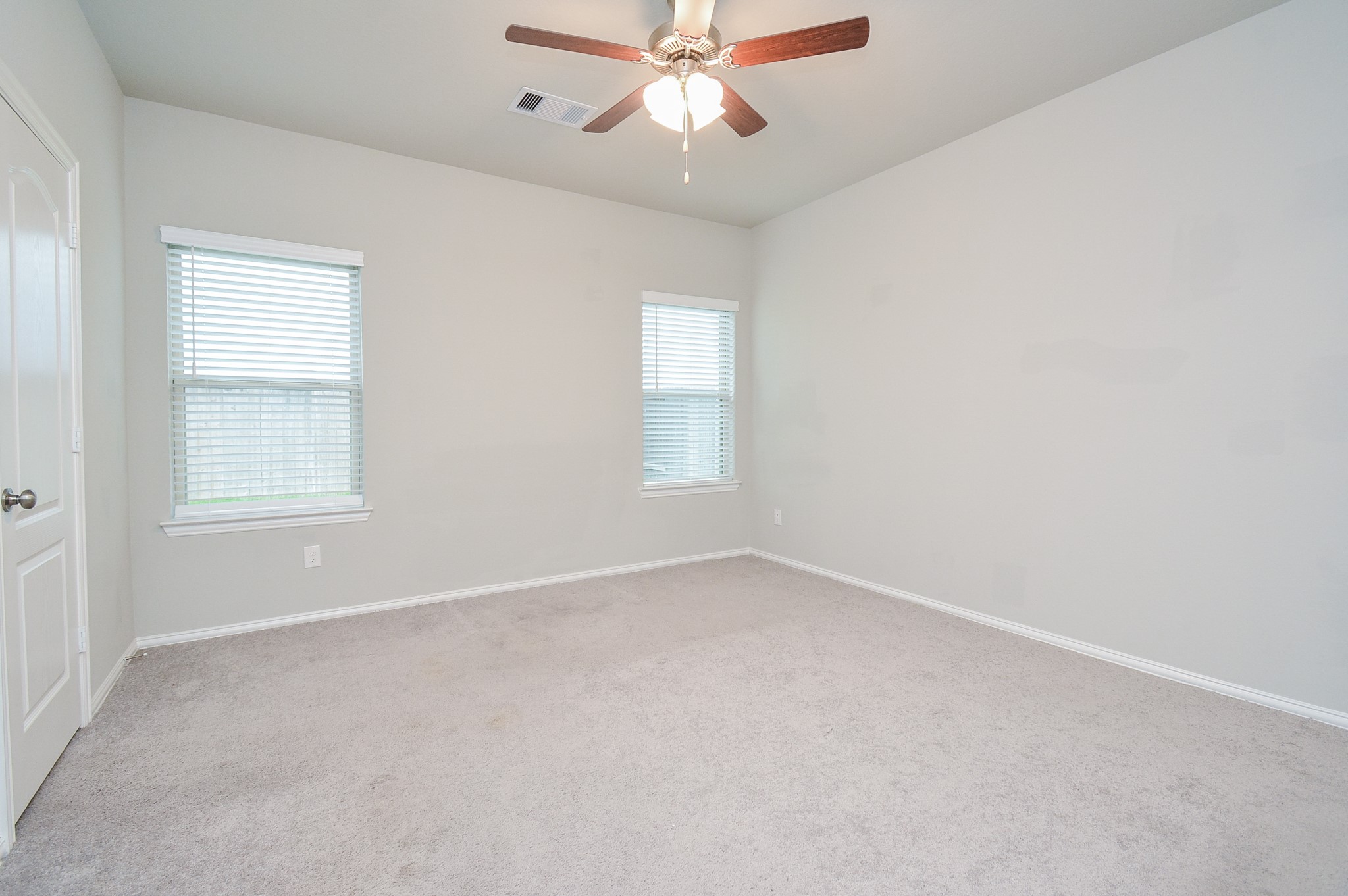 You've got great wall space for sizeable bedroom pieces, here.