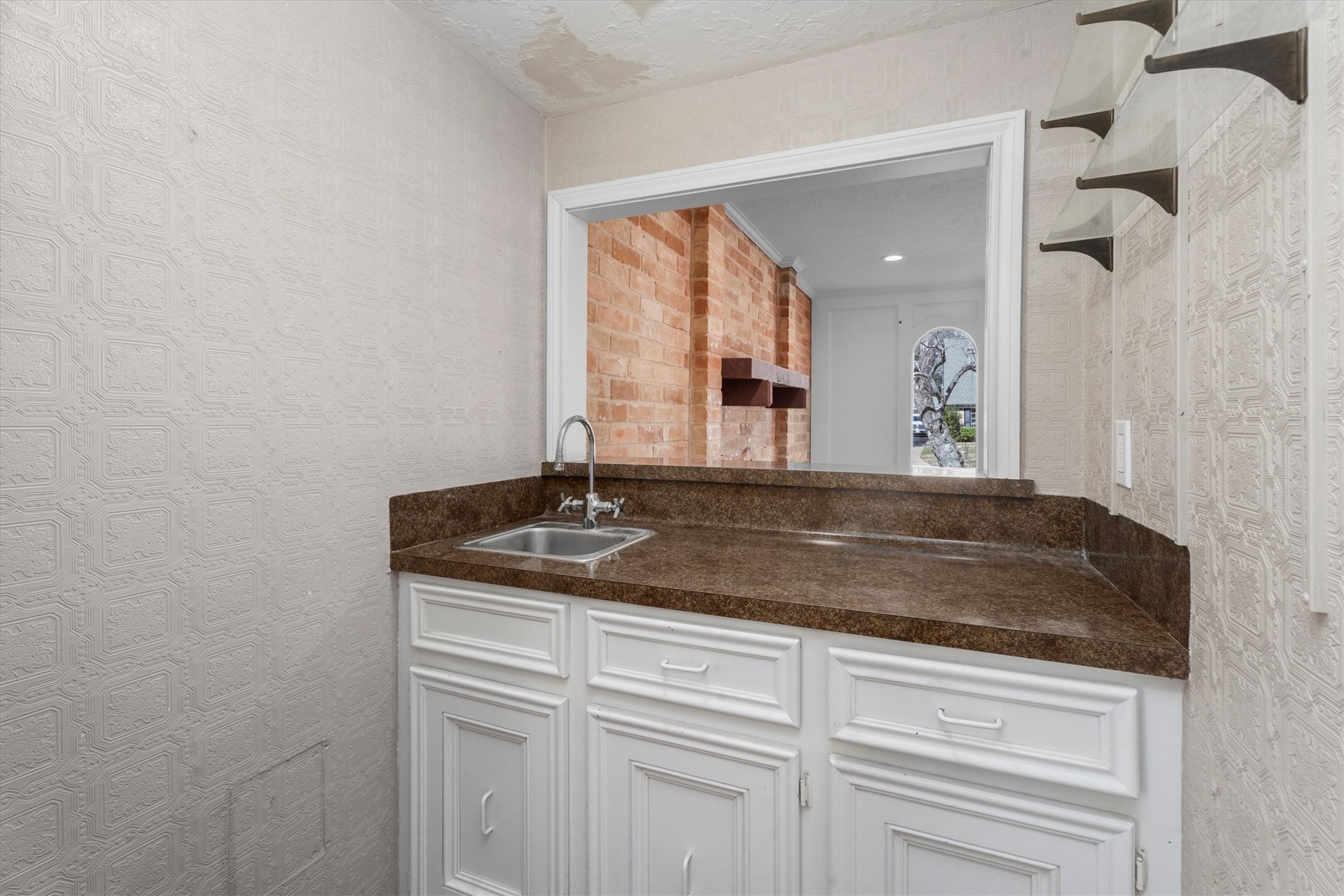 Wet Bar or would make a wonderful Coffee/Tea/Drink Bar