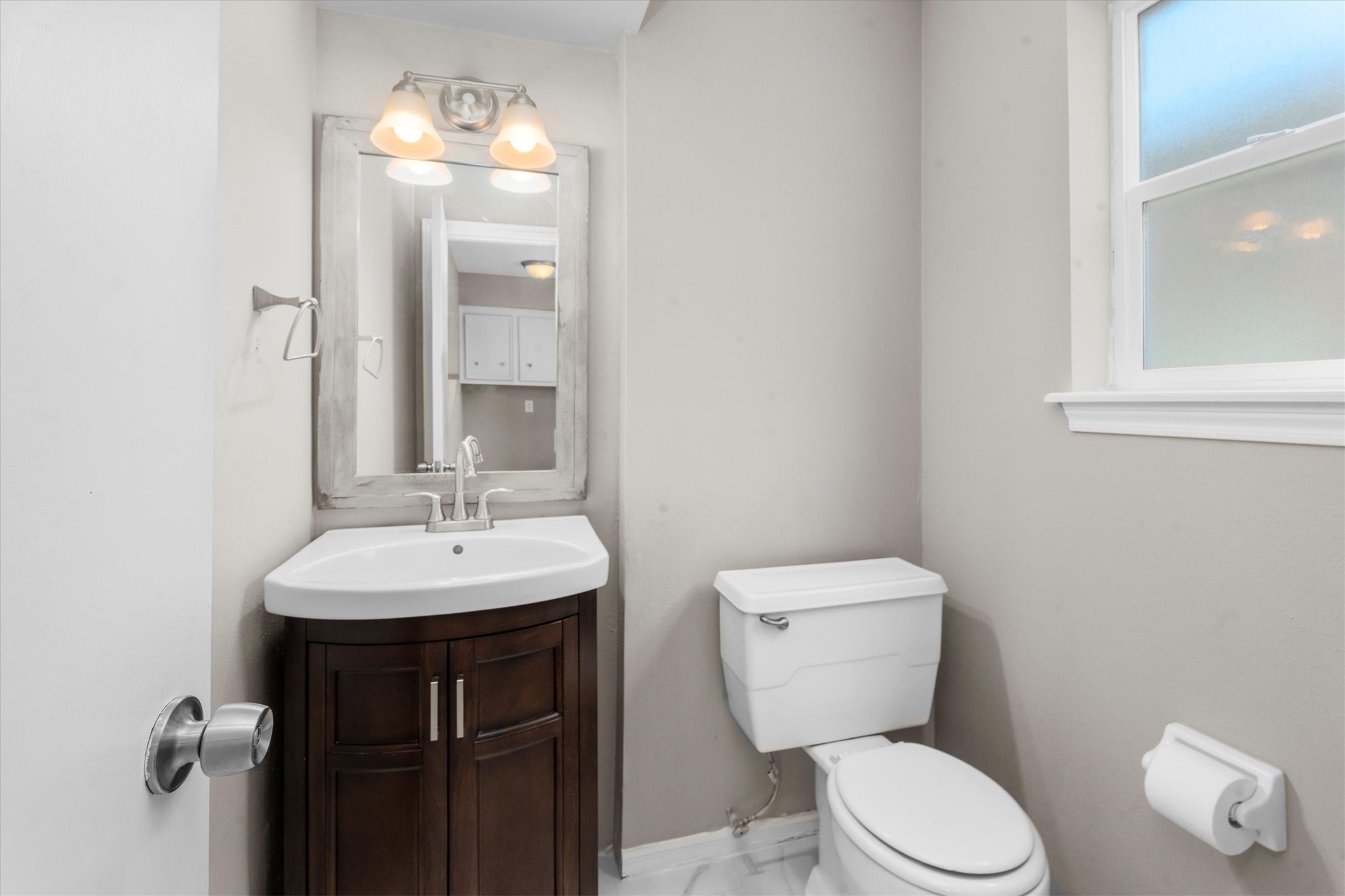 Refreshed w/tile floors, vanity, lighting, fixtures