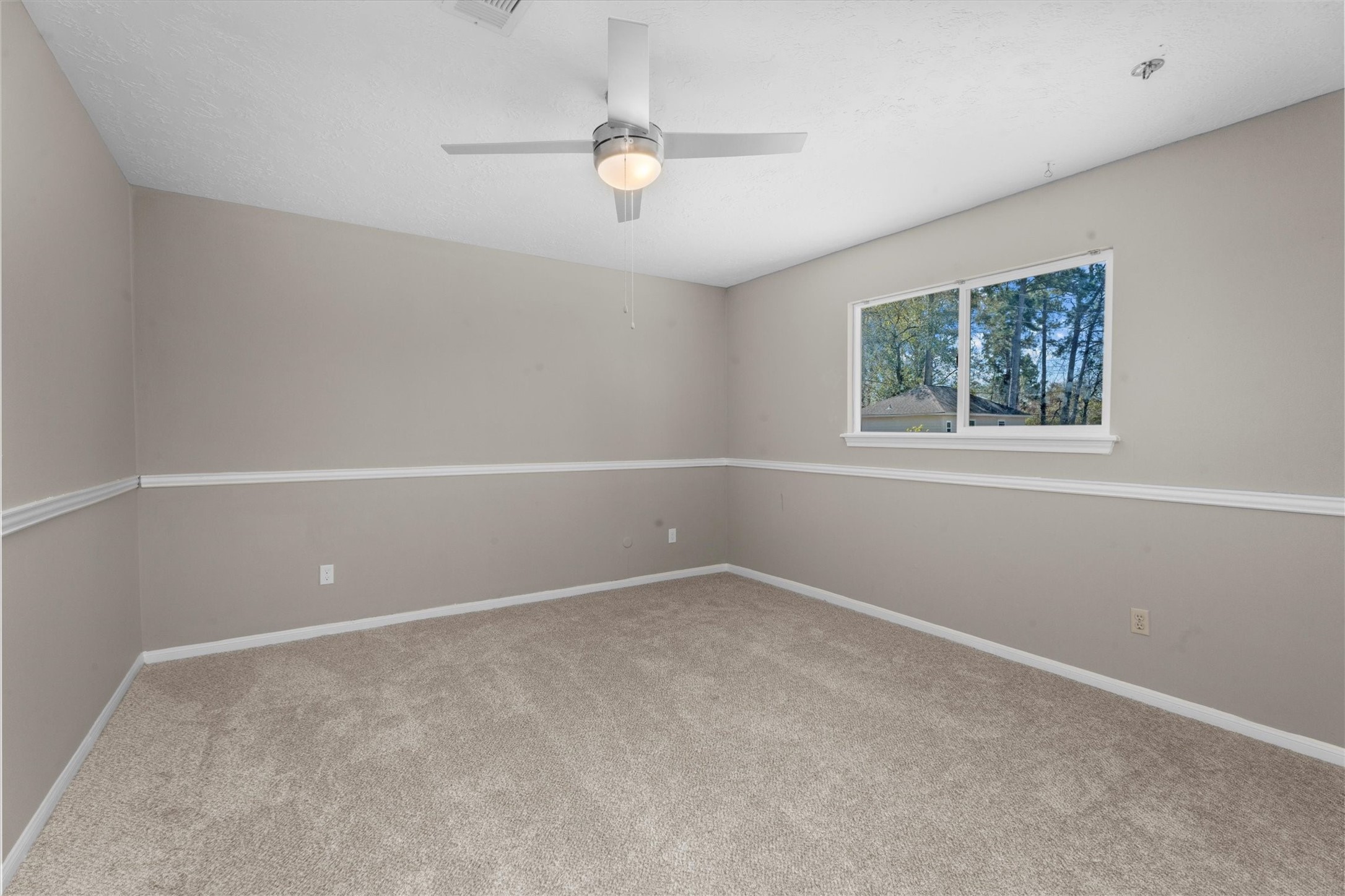 Guest Bedroom #2  has a huge walk-in closet and access to the Guest Bathroom