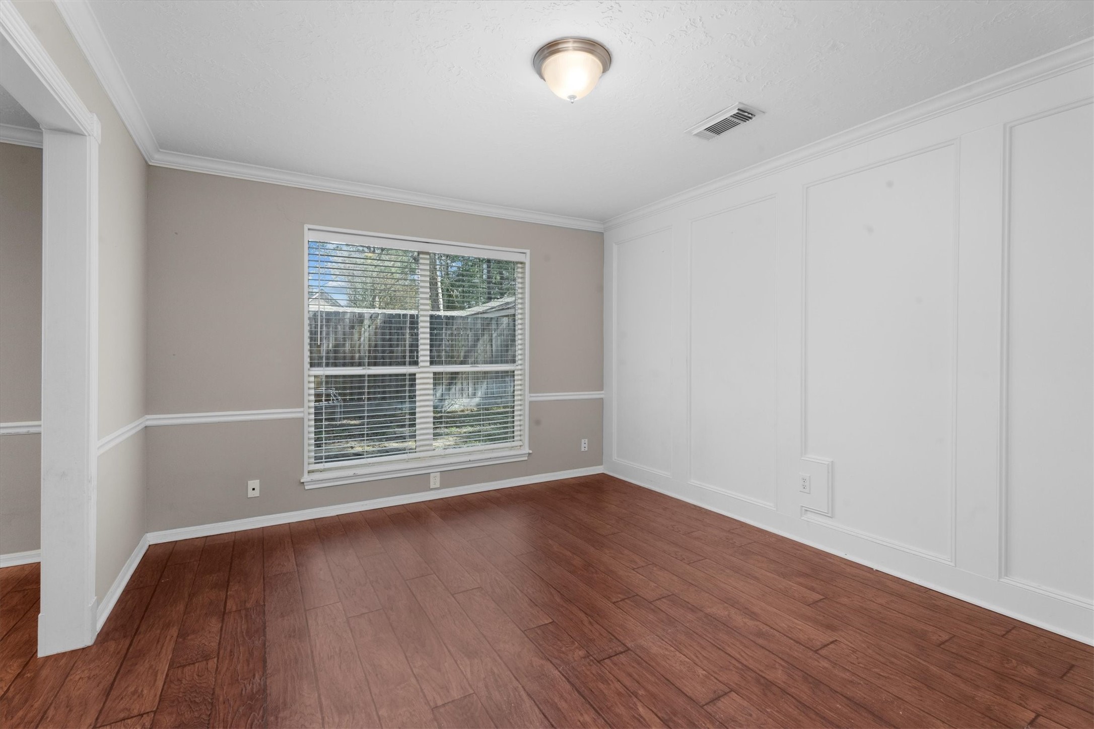 Dining Room with Wood Block , chair rail and Crown molding
