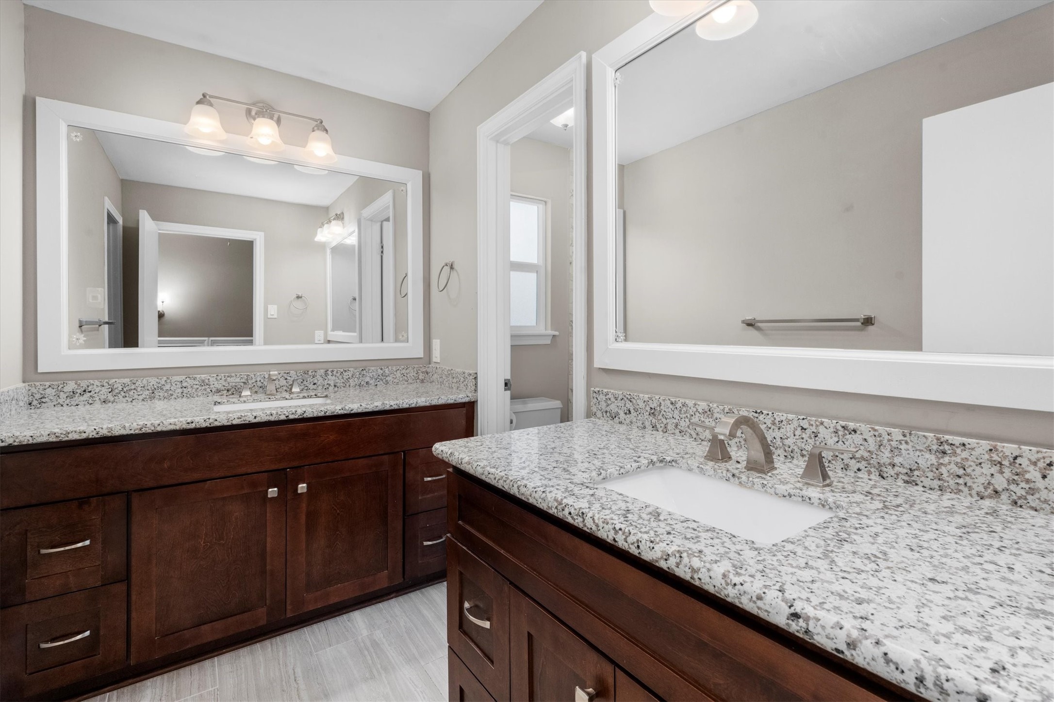 Guest Bath w/separate vanities/ granite  counters updated ighting,cabinets, fixtures