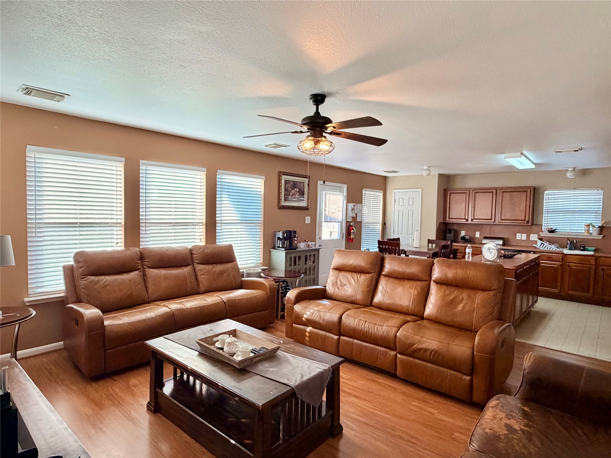 Spacious living room with lots of natural light Spacious living room with lots of natural light