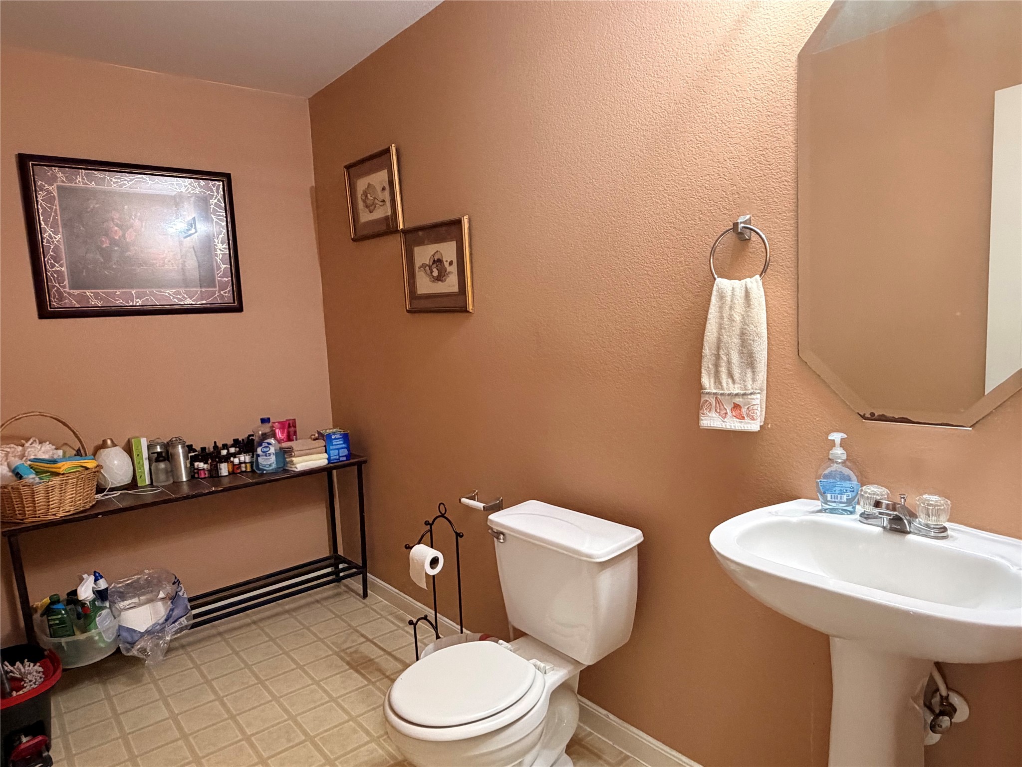 Half bathroom downstairs next to office/flex room Half bathroom downstairs next to office/flex room