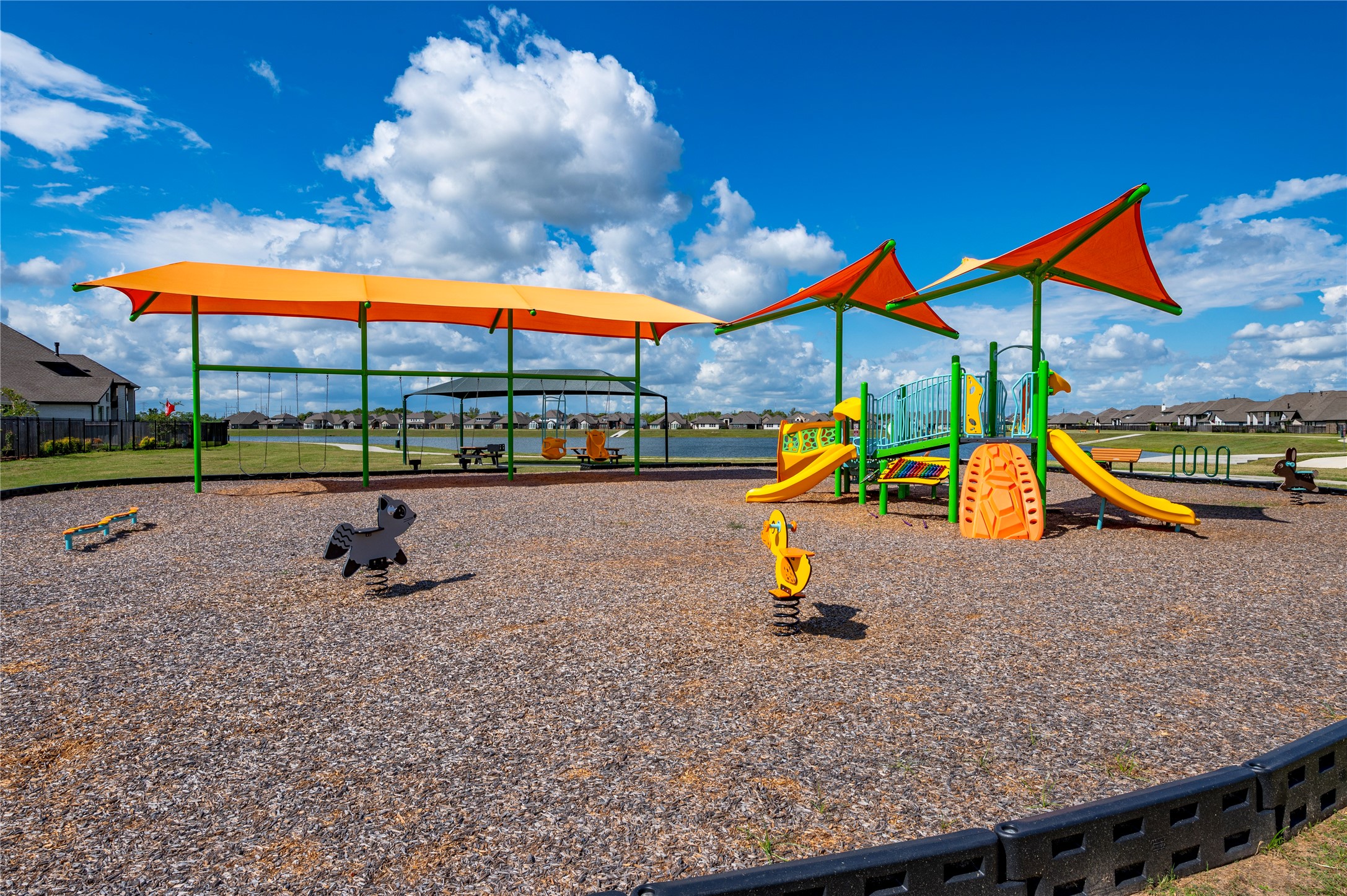 smaller of the two playgrounds surrounding the lake less than a 5-minute walk!
