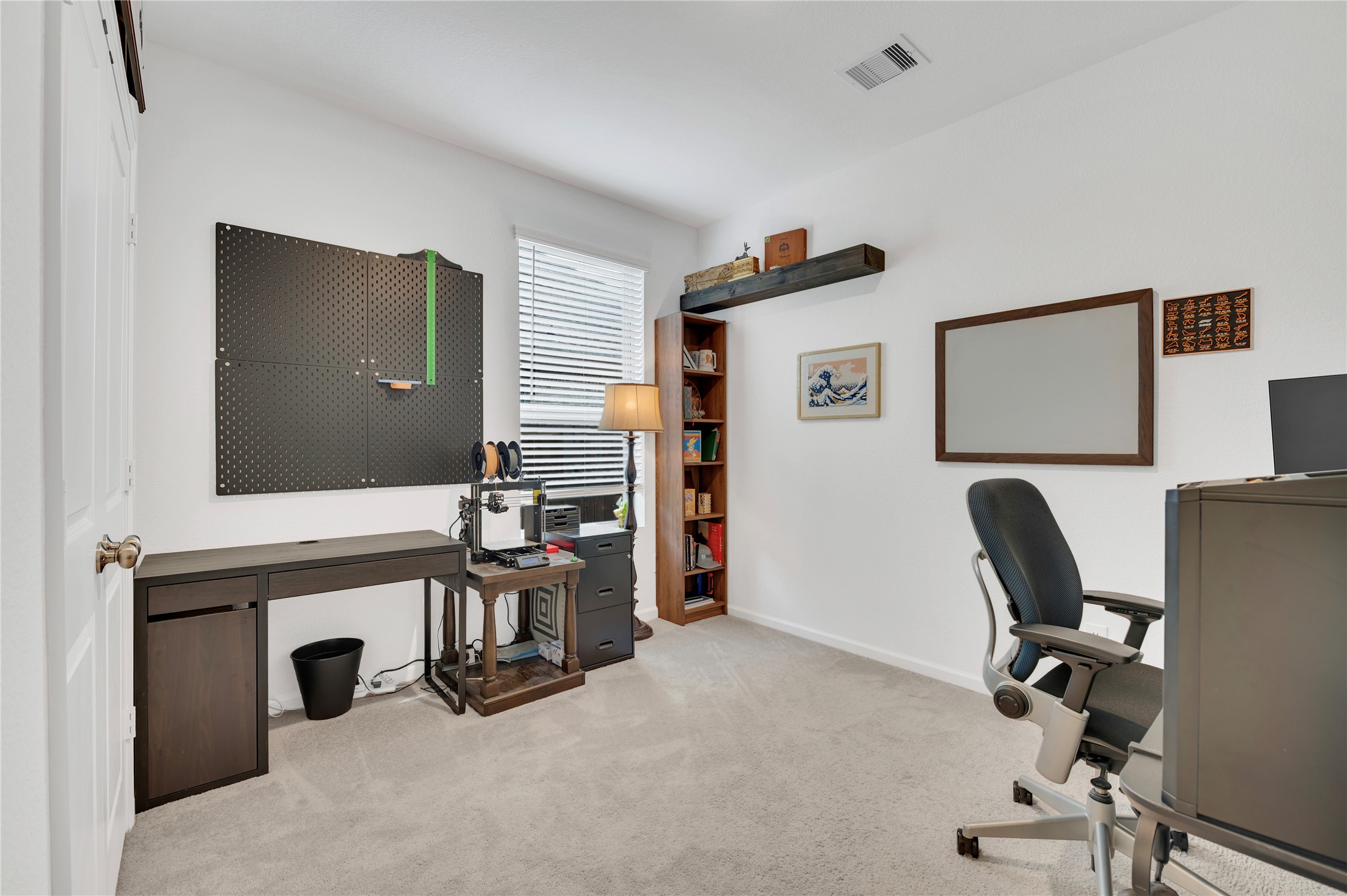 Lock off suite bedroom! Also, makes a great downstairs office!