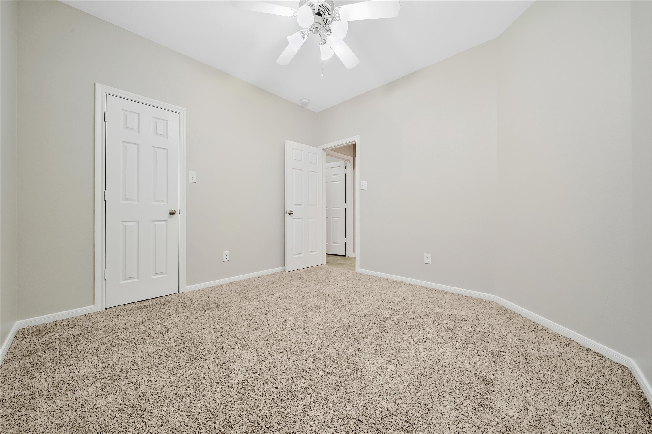 This split floorplan features secondary bedrooms that are spacious and bright. Two of the secondary bedrooms feature walk-in closets.