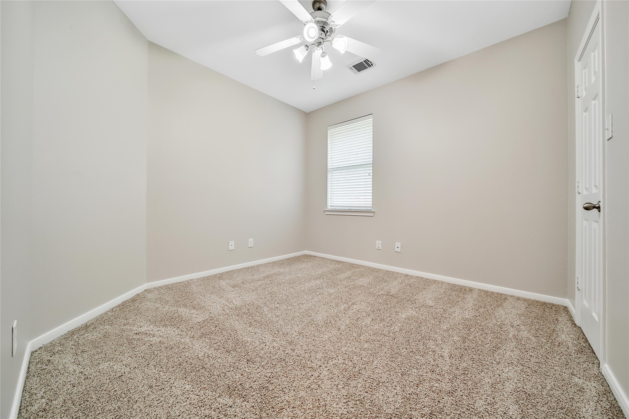 This split floorplan features secondary bedrooms that are spacious and bright. Two of the secondary bedrooms feature walk-in closets.