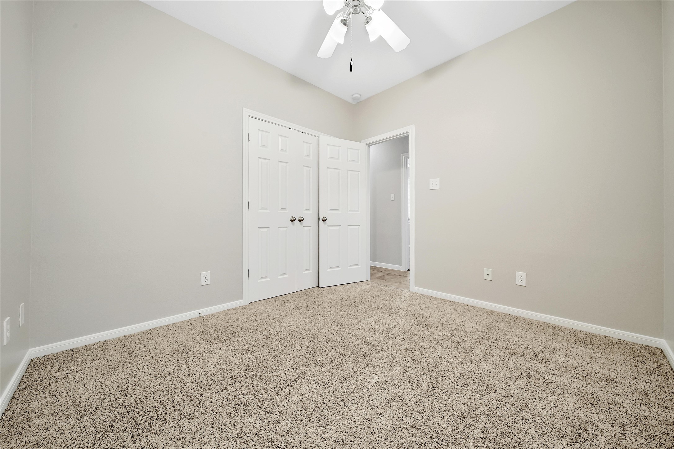 This split floorplan features secondary bedrooms that are spacious and bright. Two of the secondary bedrooms feature walk-in closets.