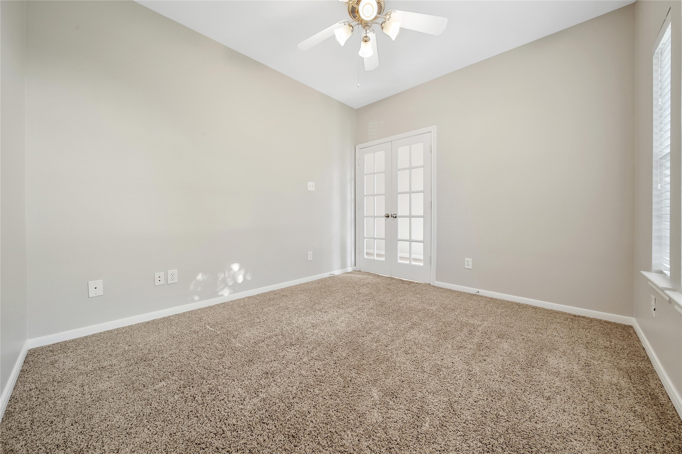 The study/flex room with french doors offers flexibility in how the space is used.