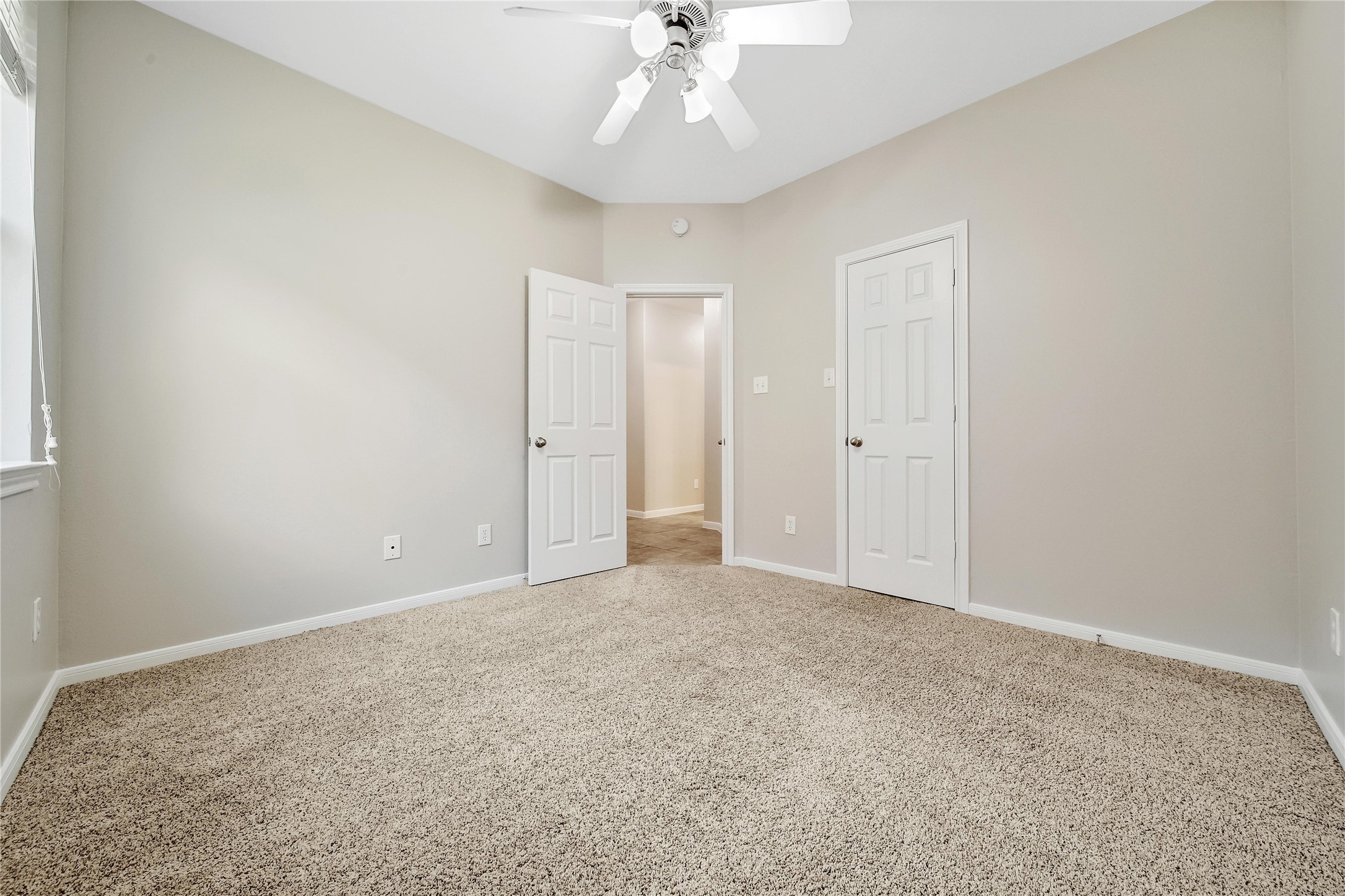 This split floorplan features secondary bedrooms that are spacious and bright. Two of the secondary bedrooms feature walk-in closets.