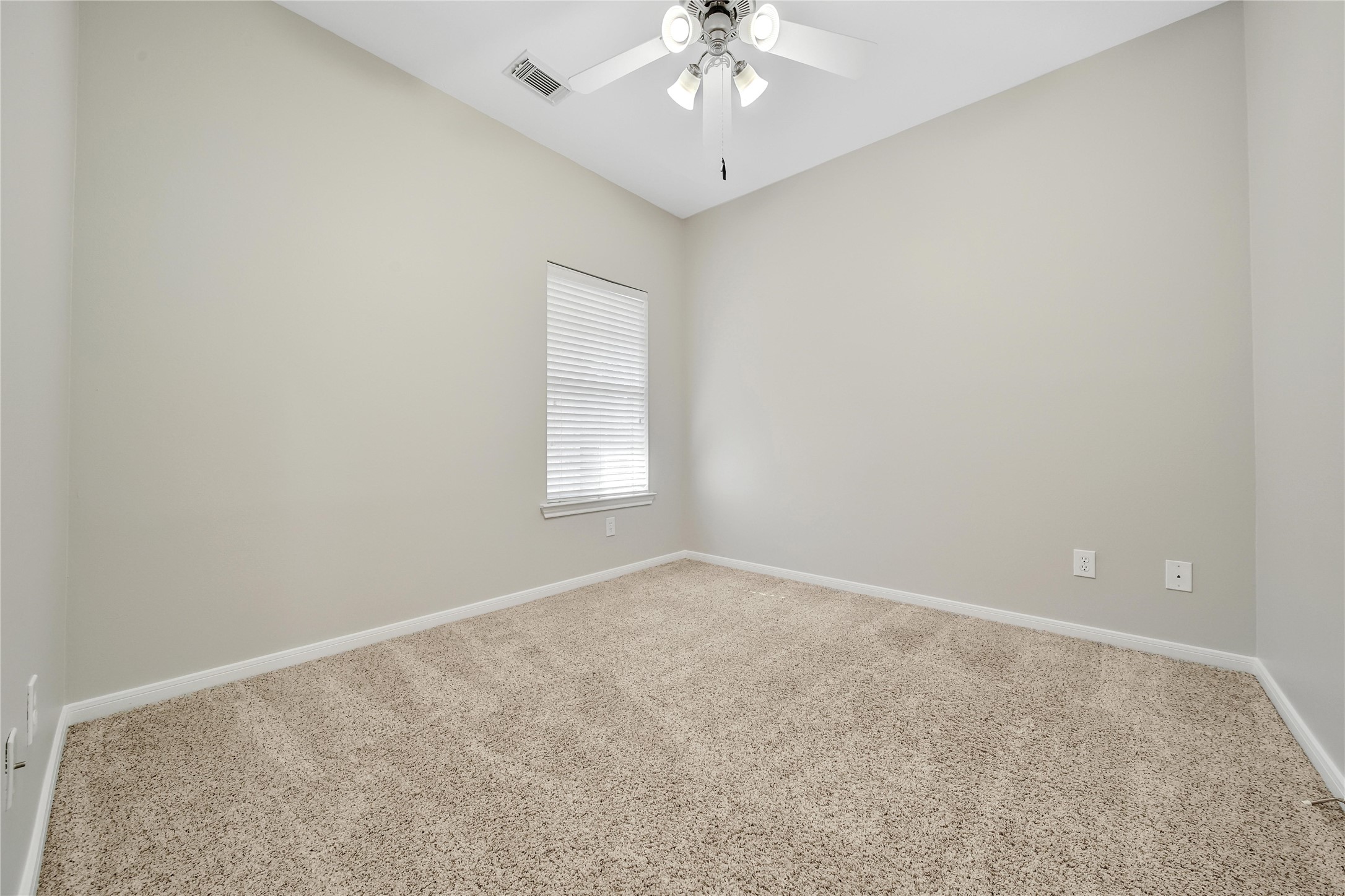 This split floorplan features secondary bedrooms that are spacious and bright. Two of the secondary bedrooms feature walk-in closets.