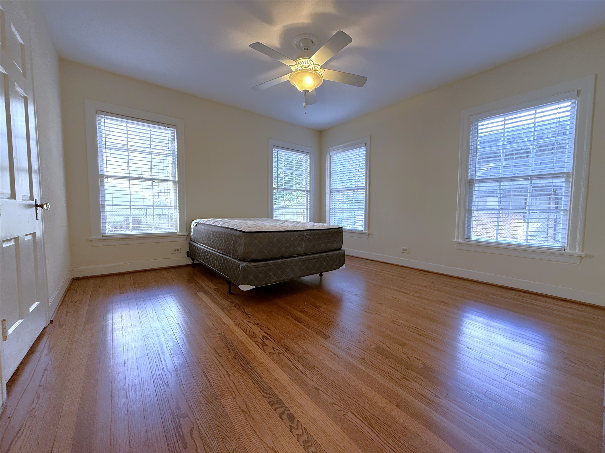 The secondary bedroom offers a ceiling fan w/light fixture.