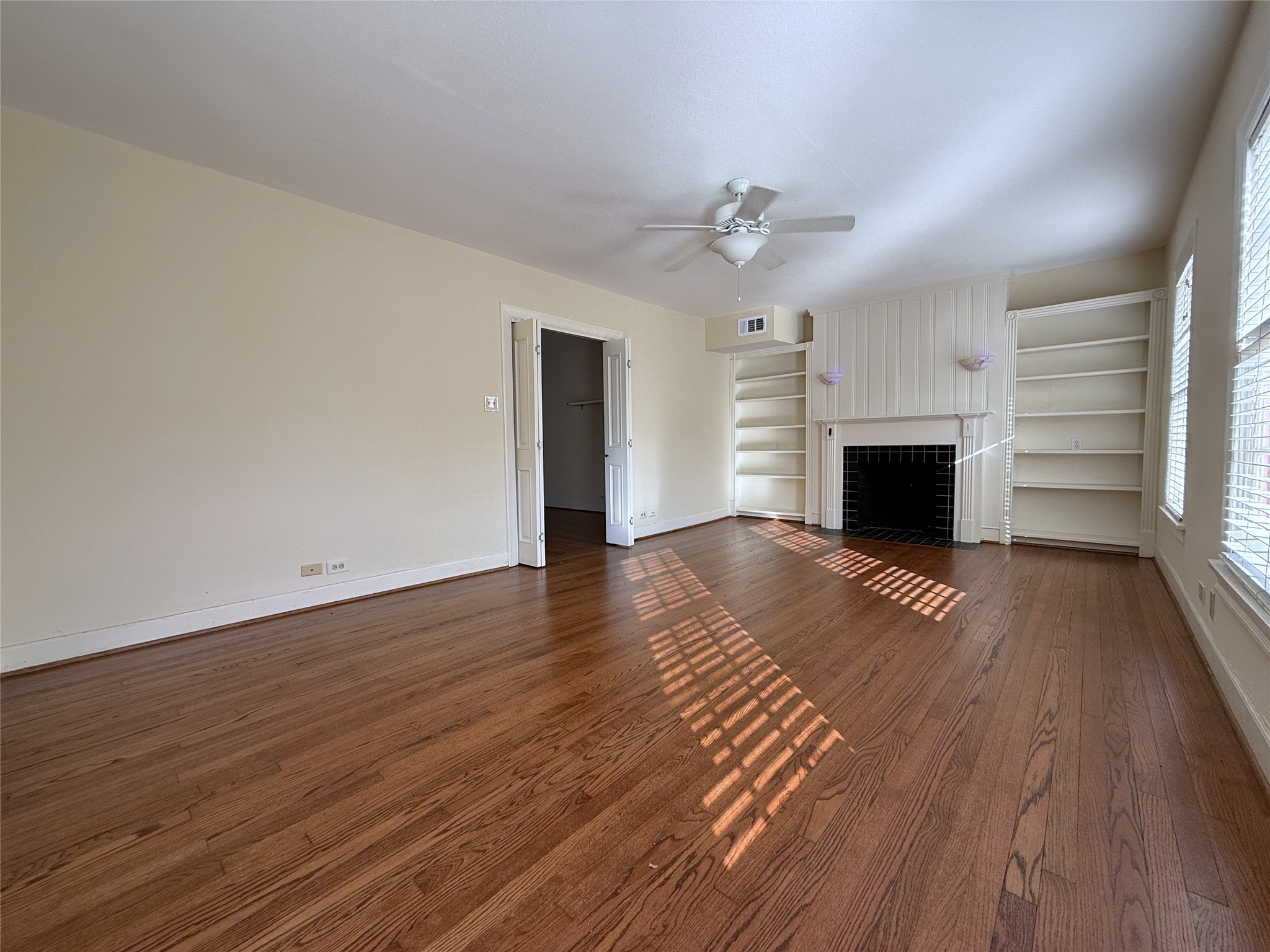 Enjoy real hardwood flooring! Folding doors open to the dining room.
