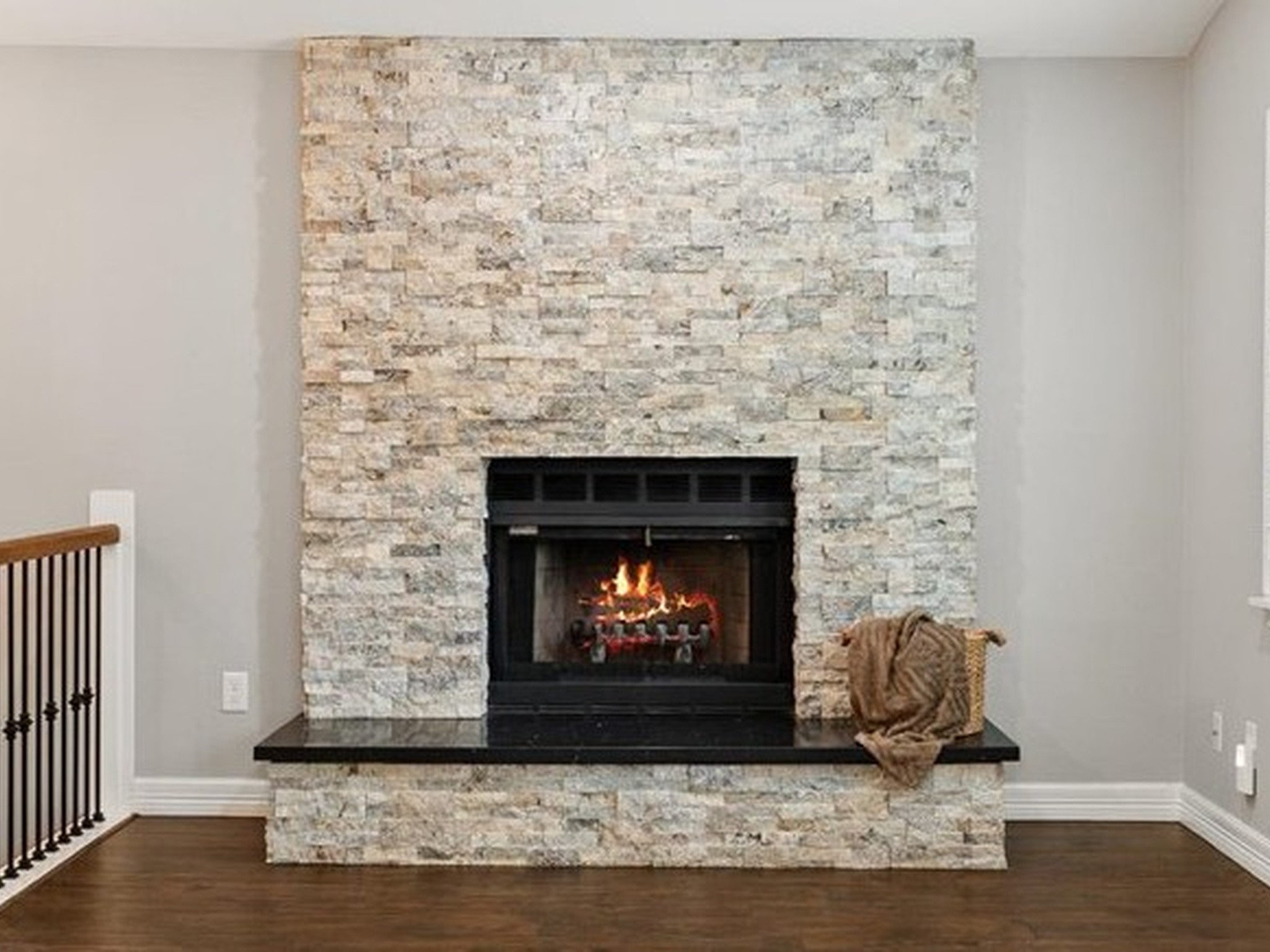 Beautiful stacked stone fireplace for cozy evenings