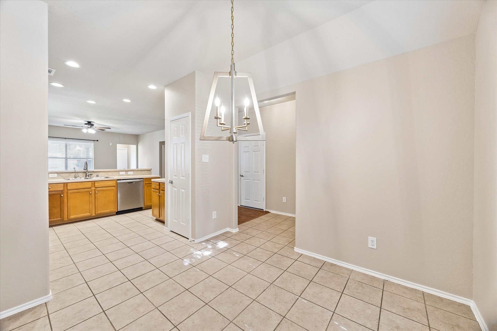 The dining room connects to the kitchen, creating an easy flow for everyday meals and entertaining.