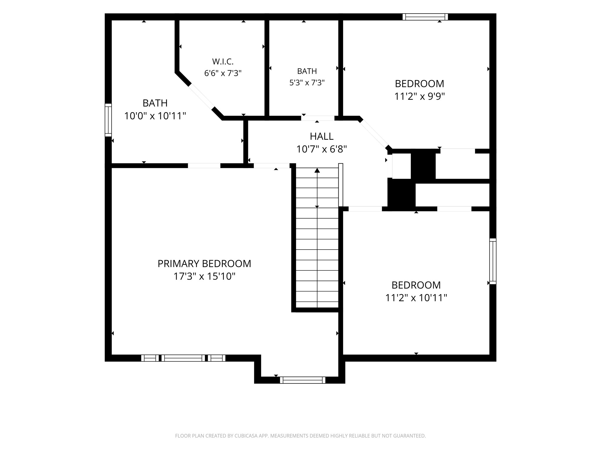 Spacious upper level featuring a large primary bedroom with a walk-in closet, two additional bedrooms, and two bathrooms for convenience.