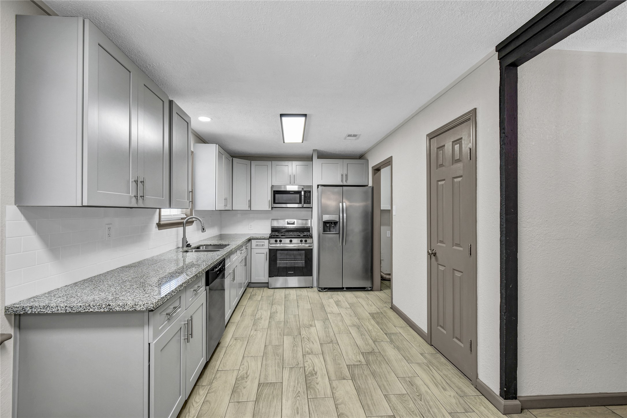 Spacious Kitchen with stainless steel appliances Spacious Kitchen with stainless steel appliances