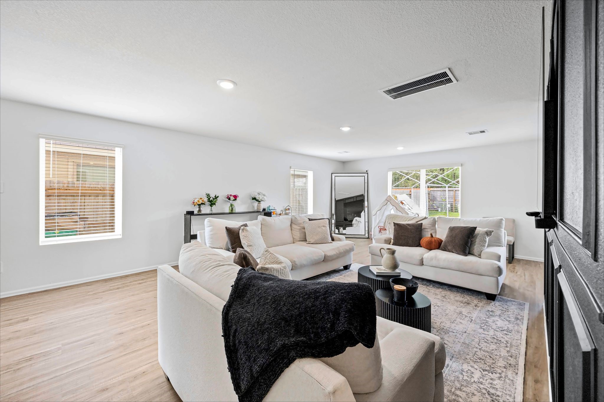 Spacious family room with tons of natural light