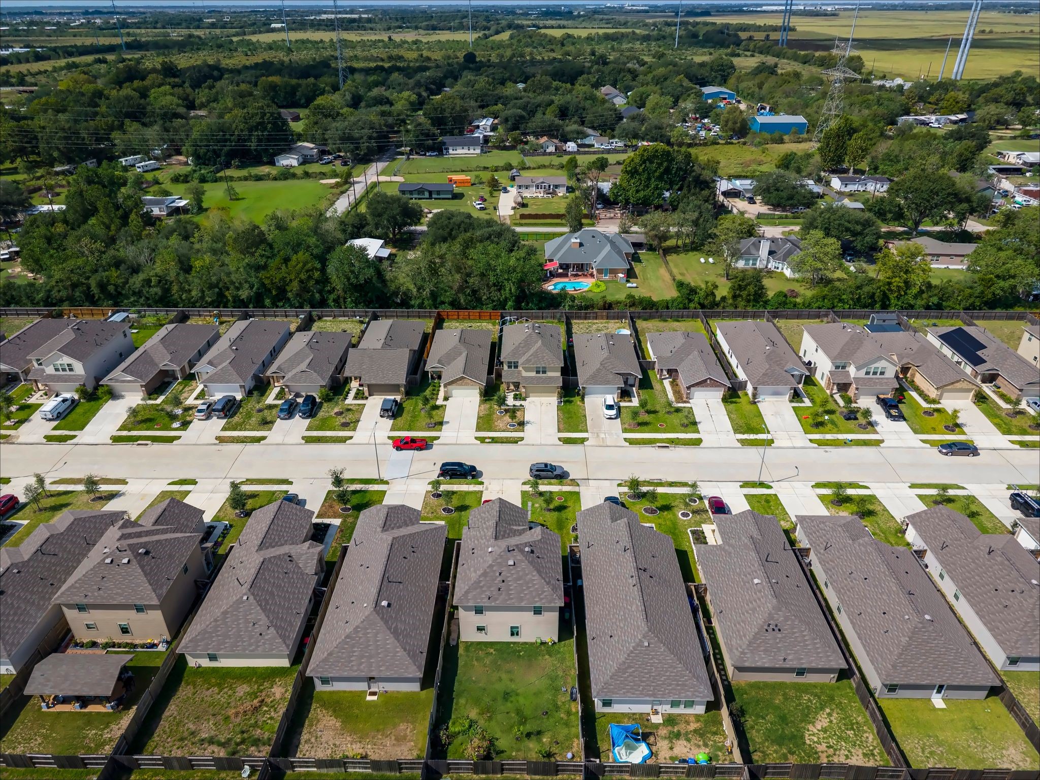 Aerial view of the neighborhood and surrounding green space