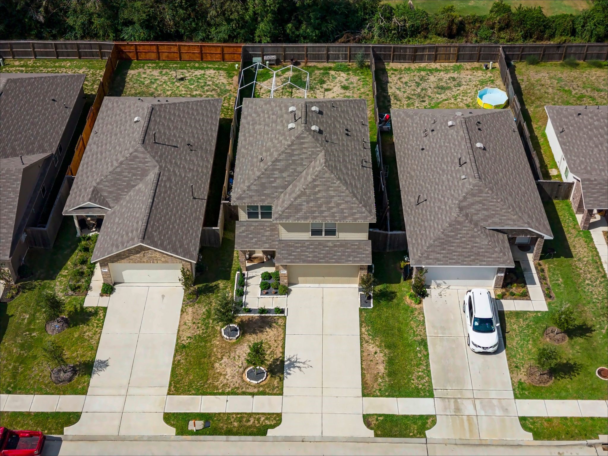 Overhead front view of the driveway and front yard