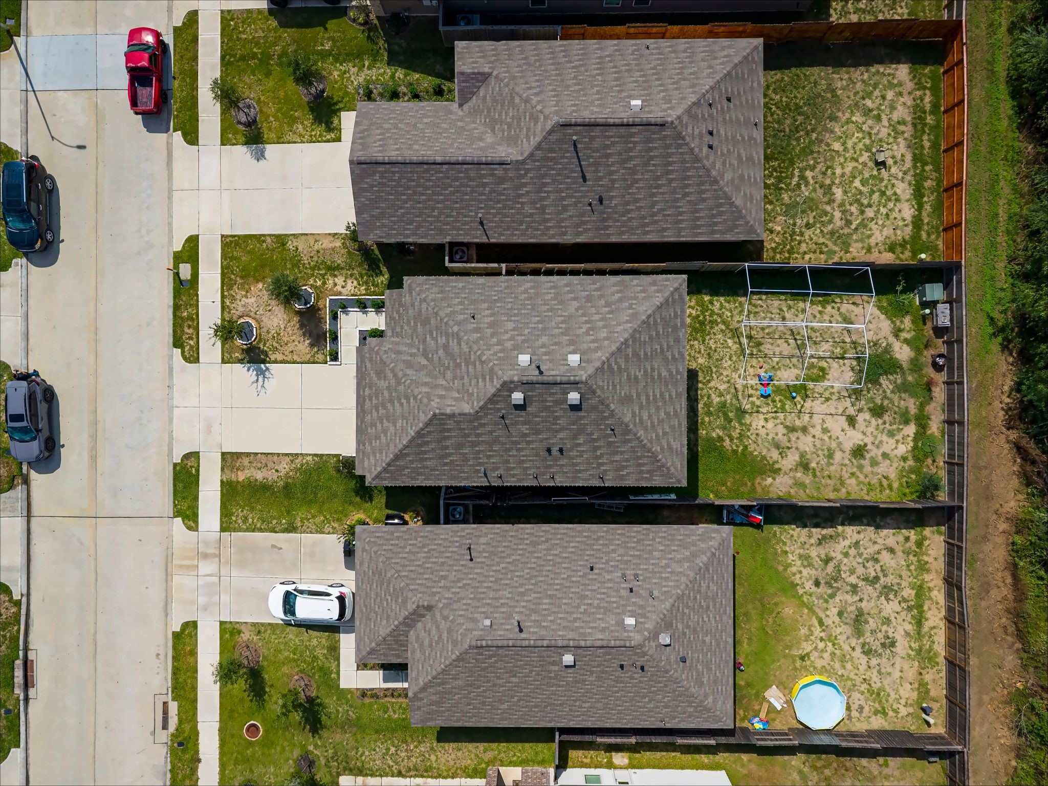 Overhead view of the lot and fenced backyard