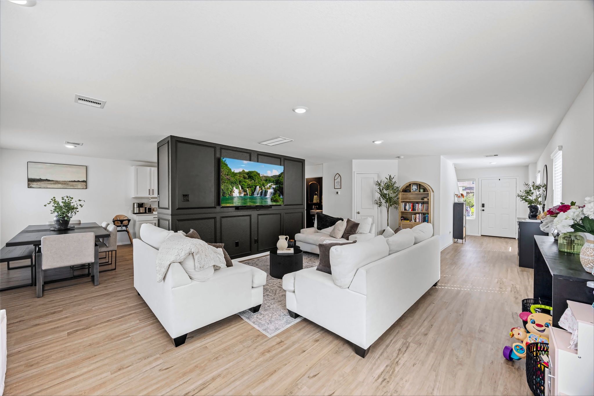 Living room flows right into the dining area and kitchen