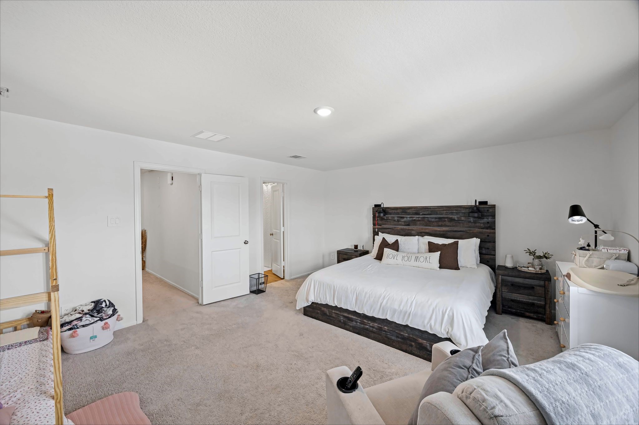 Primary bedroom with room for a sitting area