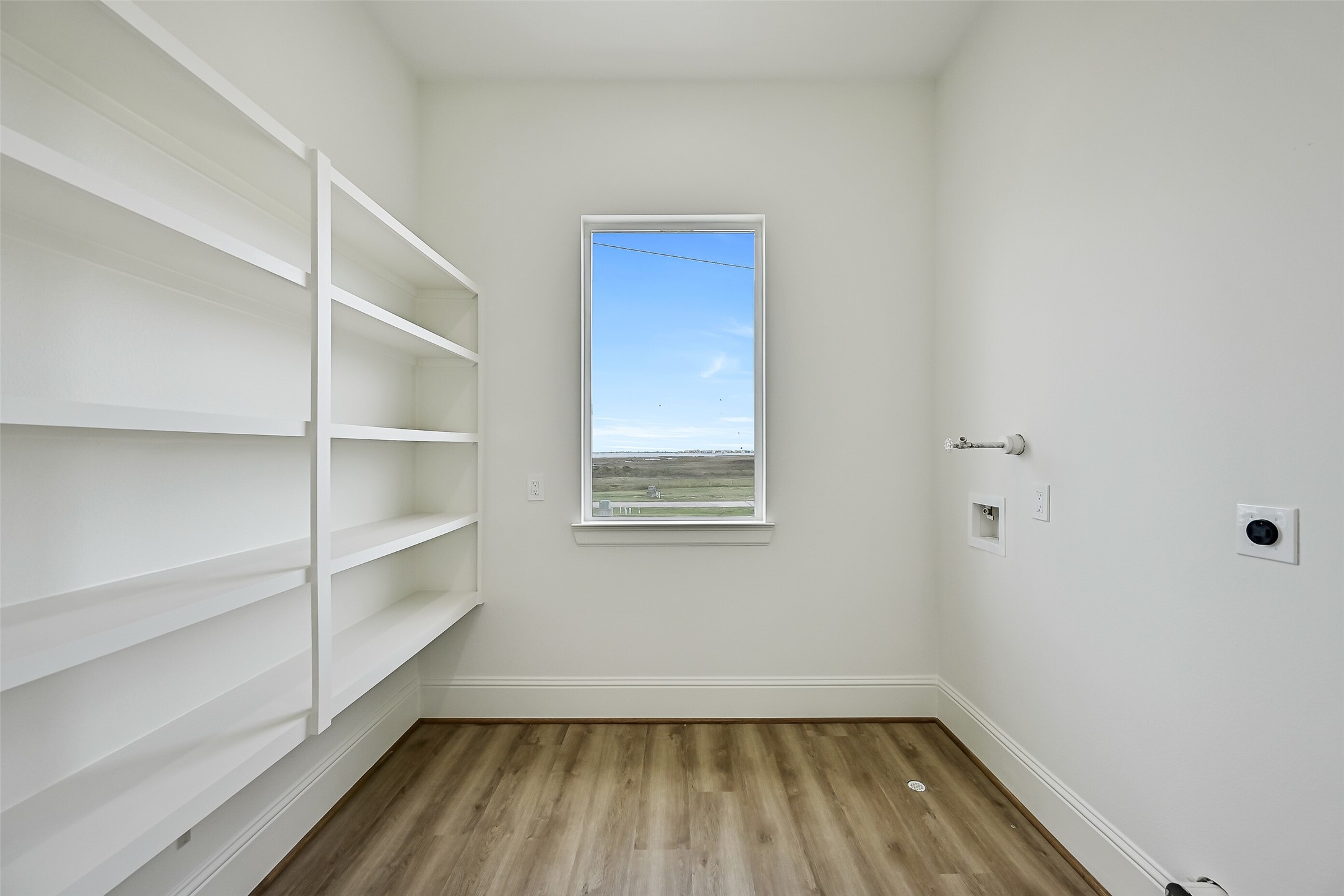 Conveniently located just off the kitchen, you'll find a spacious pantry and utility room.