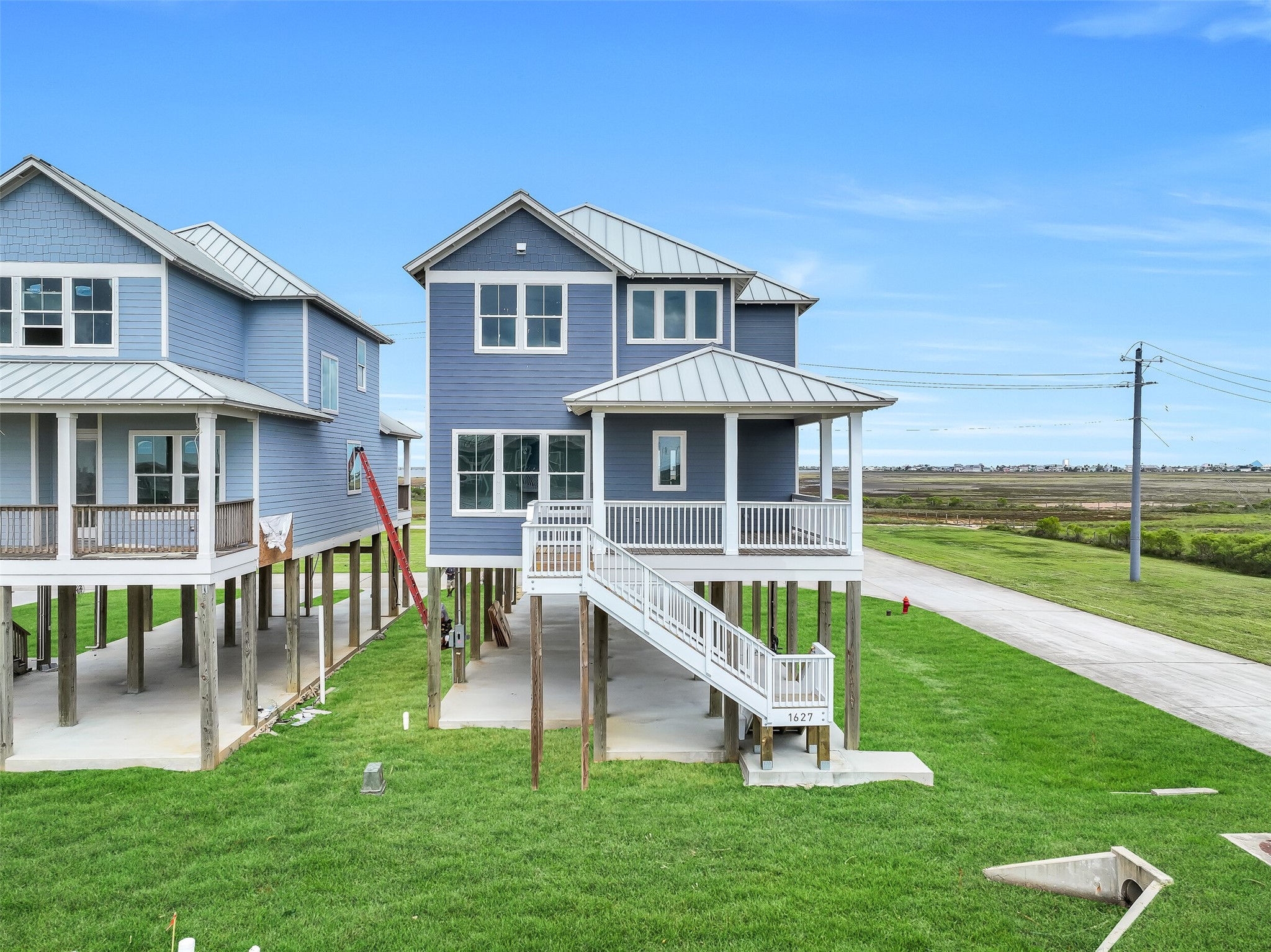 Located on a corner lot, this home boasts stunning bay views from both the east- and west-facing decks.