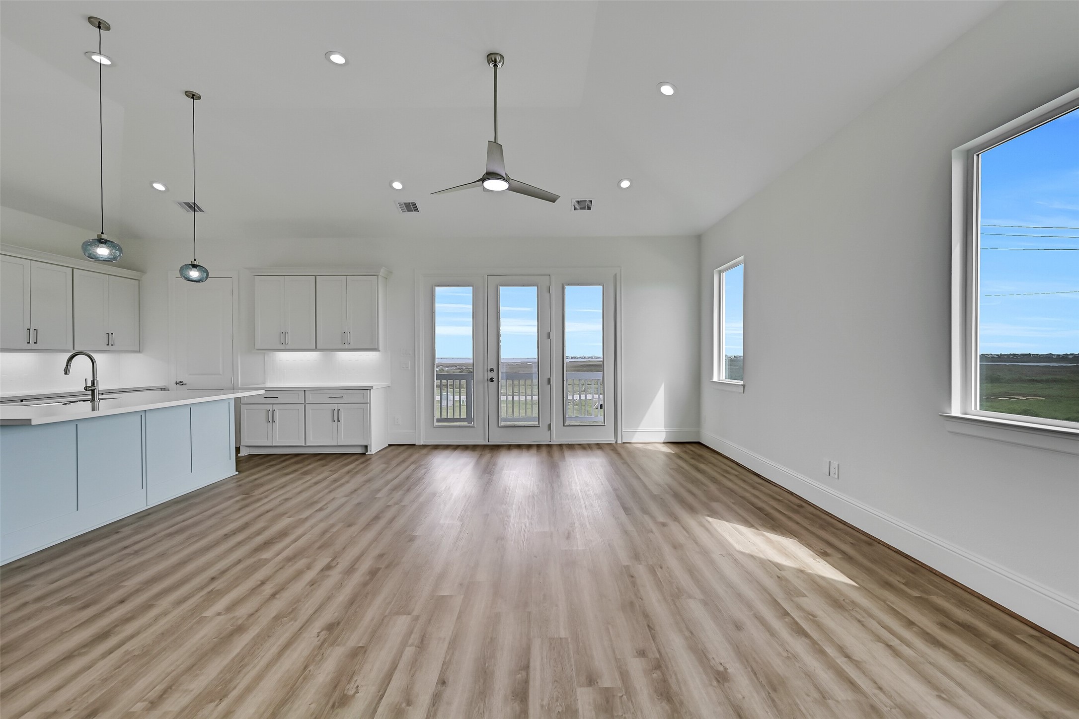 The kitchen is conveniently located just off the living area, creating a seamless flow between spaces and making hosting and entertaining effortless.