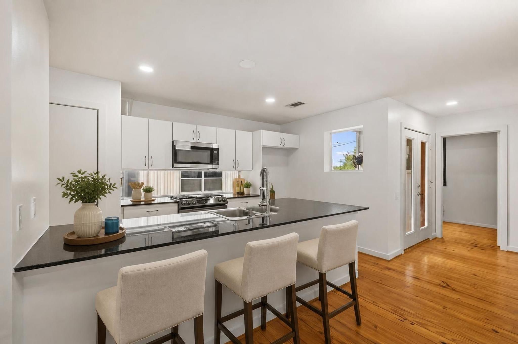 Kitchen. Virtually staged.