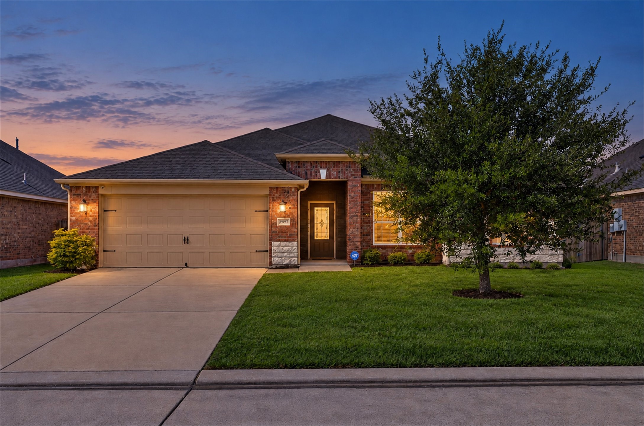 The home's brick exterior and established landscaping add character, while the single-story design keeps everyday living on one level.