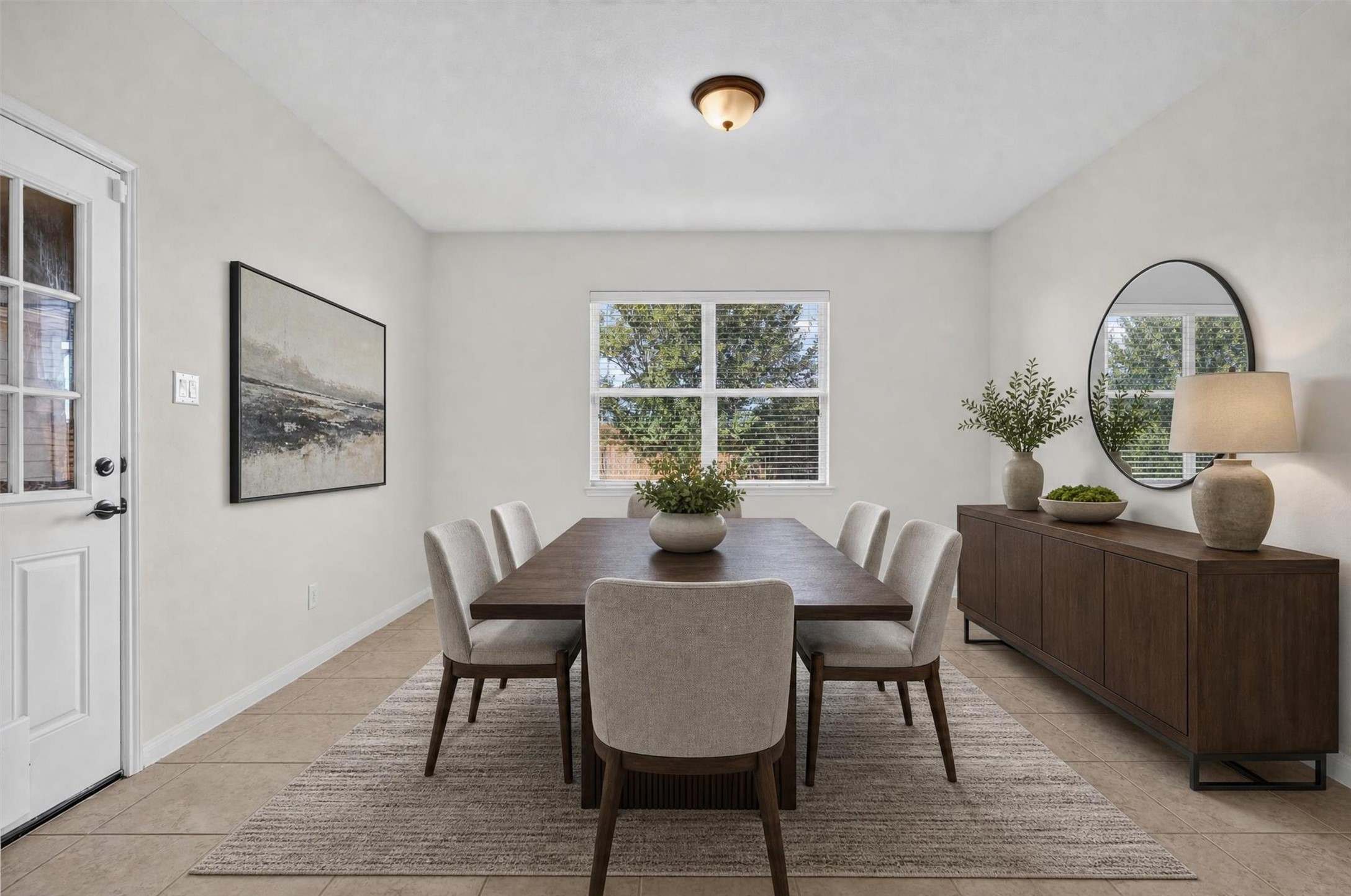 While the wide arched opening connects the kitchen to a sunny dining area keeping everyone together from morning coffee to evening gatherings.