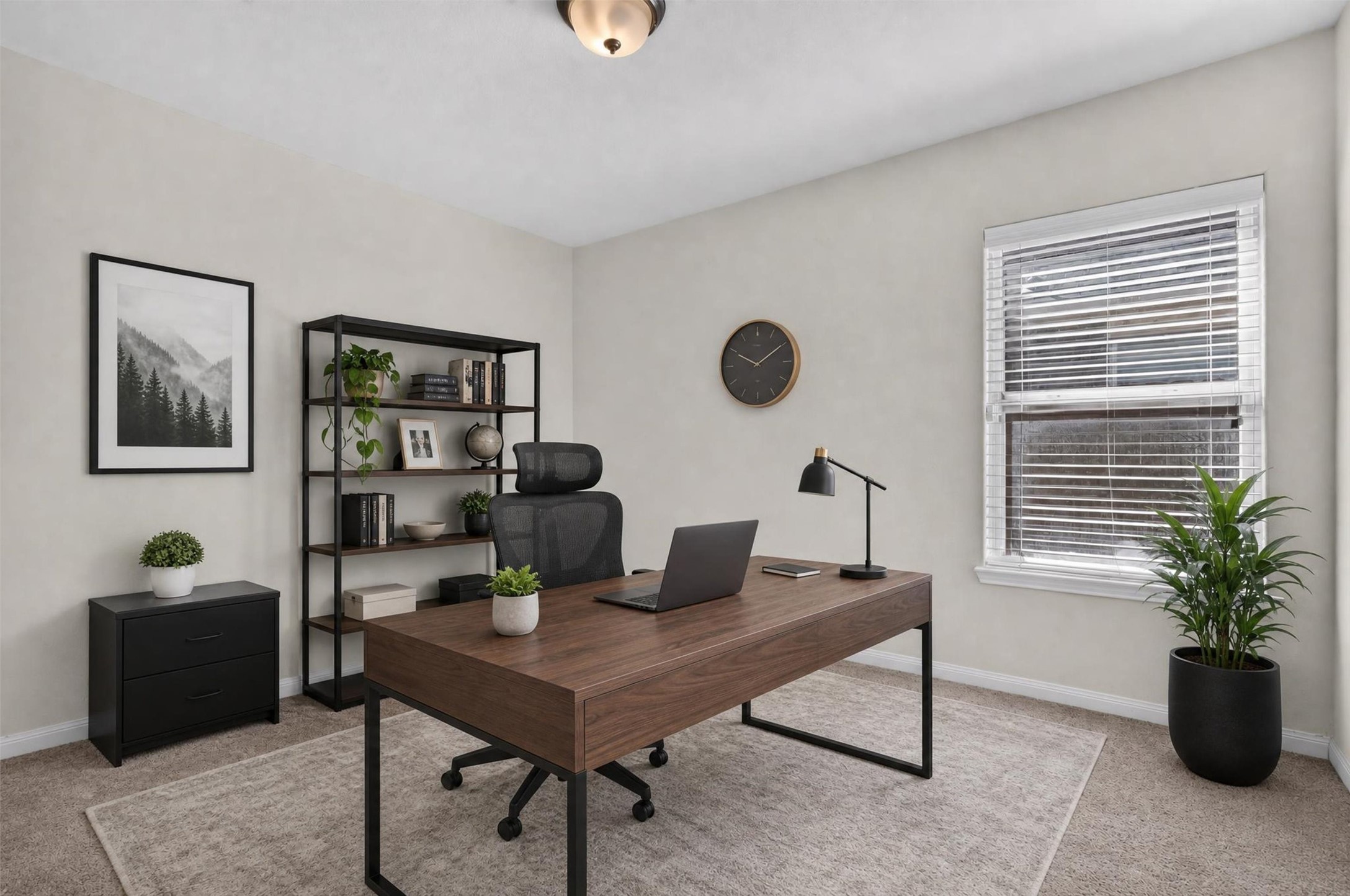 Space that adapts to your lifestyle! This versatile bedroom makes an inviting home office or a comfortable extra bedroom. A large window welcomes natural light, while neutral walls and soft carpeting provide a warm backdrop for your furnishings
