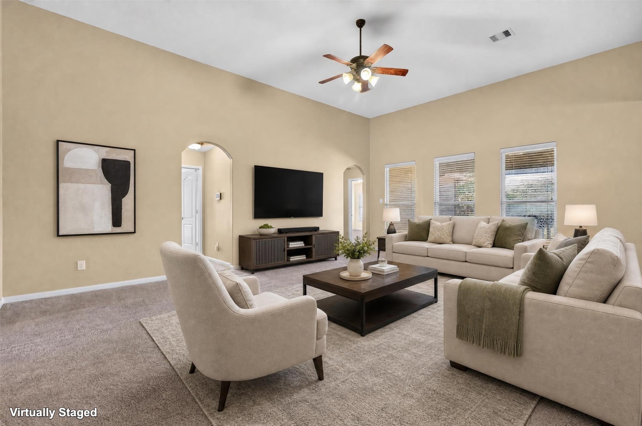 The primary suite offers a welcoming retreat from the pace of everyday life, inviting you to settle in with a good book, enjoy a slow weekend morning, or recharge after a long day.