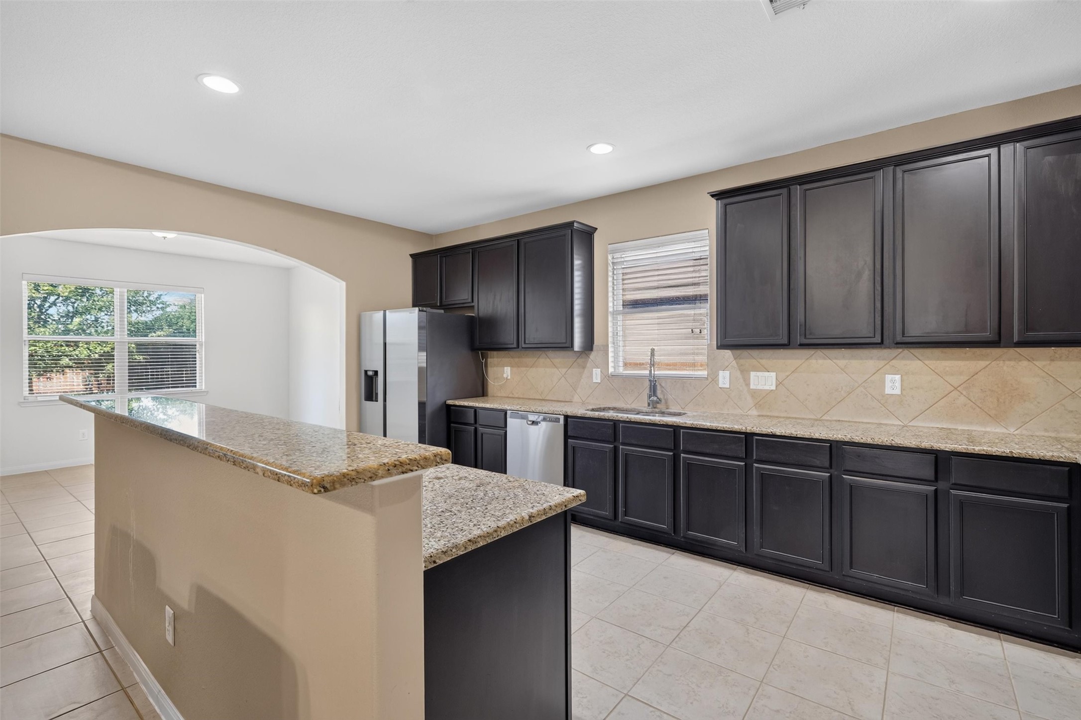 A kitchen window welcomes natural light