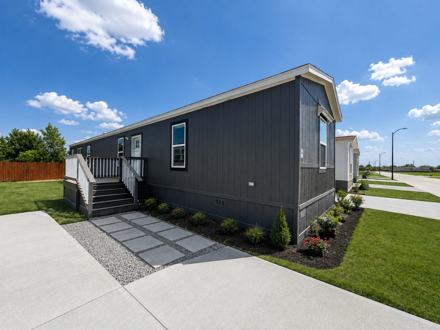 Welcome home to this beautiful 2027 Jessup Wilson! Featuring a stunning charcoal-gray exterior with crisp white trim, a welcoming front porch, and thoughtfully designed landscaping, this home offers exceptional curb appeal.