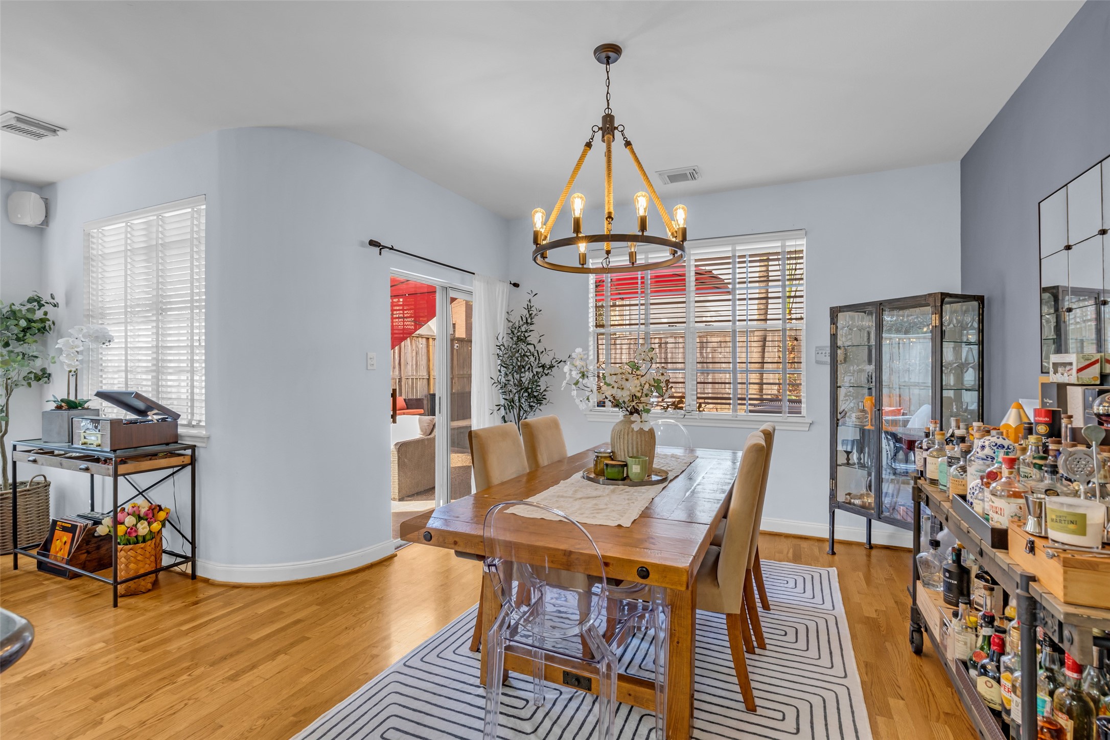 The dining room overlooks the backyard, sliding doors lead to the patio area. The dining room overlooks the backyard, sliding doors lead to the patio area.