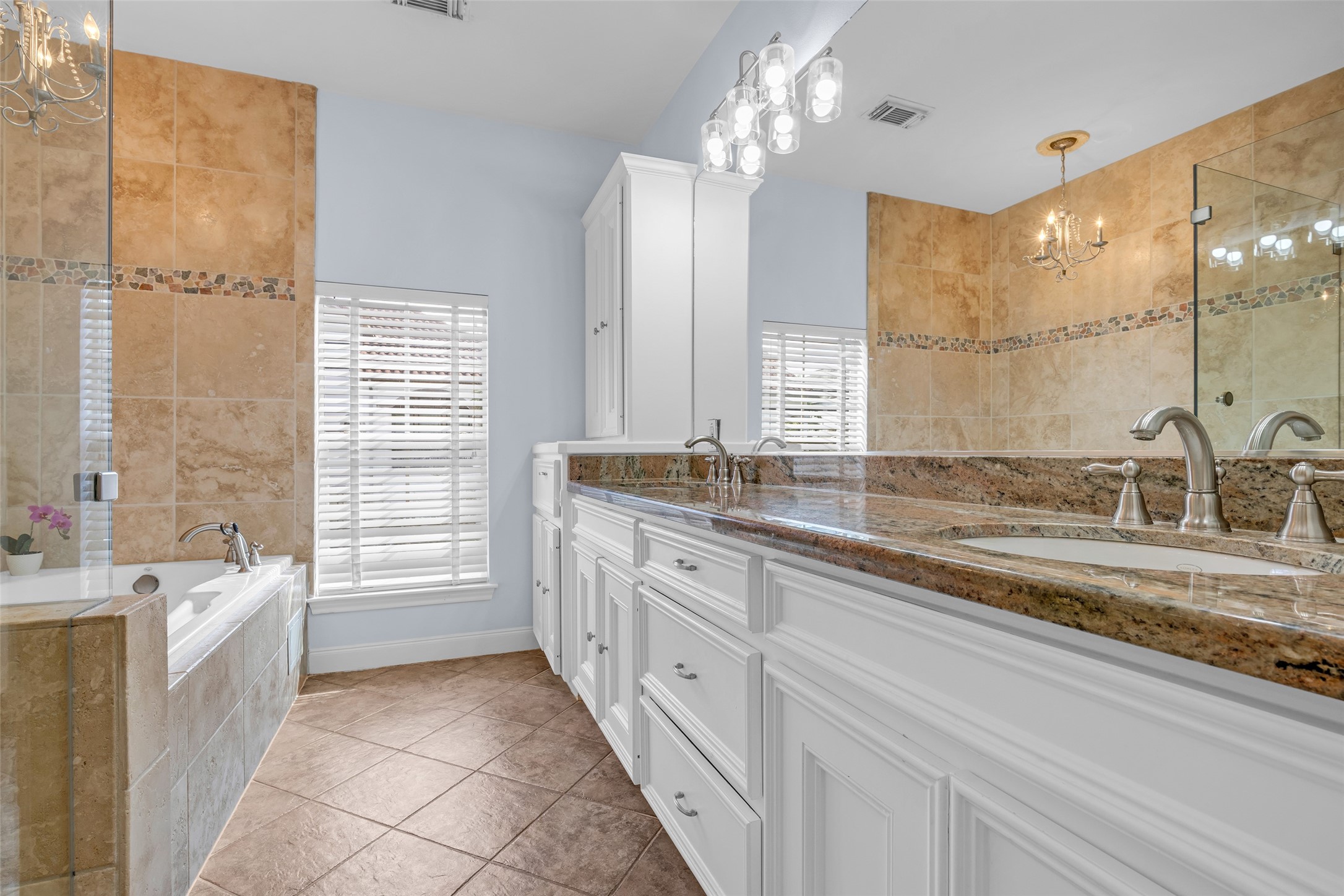 The primary bathroom with separate shower and tub.